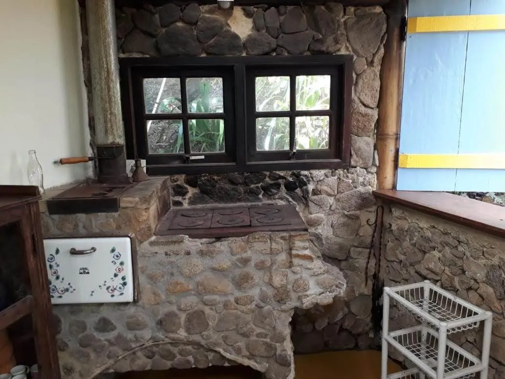 Kitchen or kitchenette in Chales Bamboo Jungle