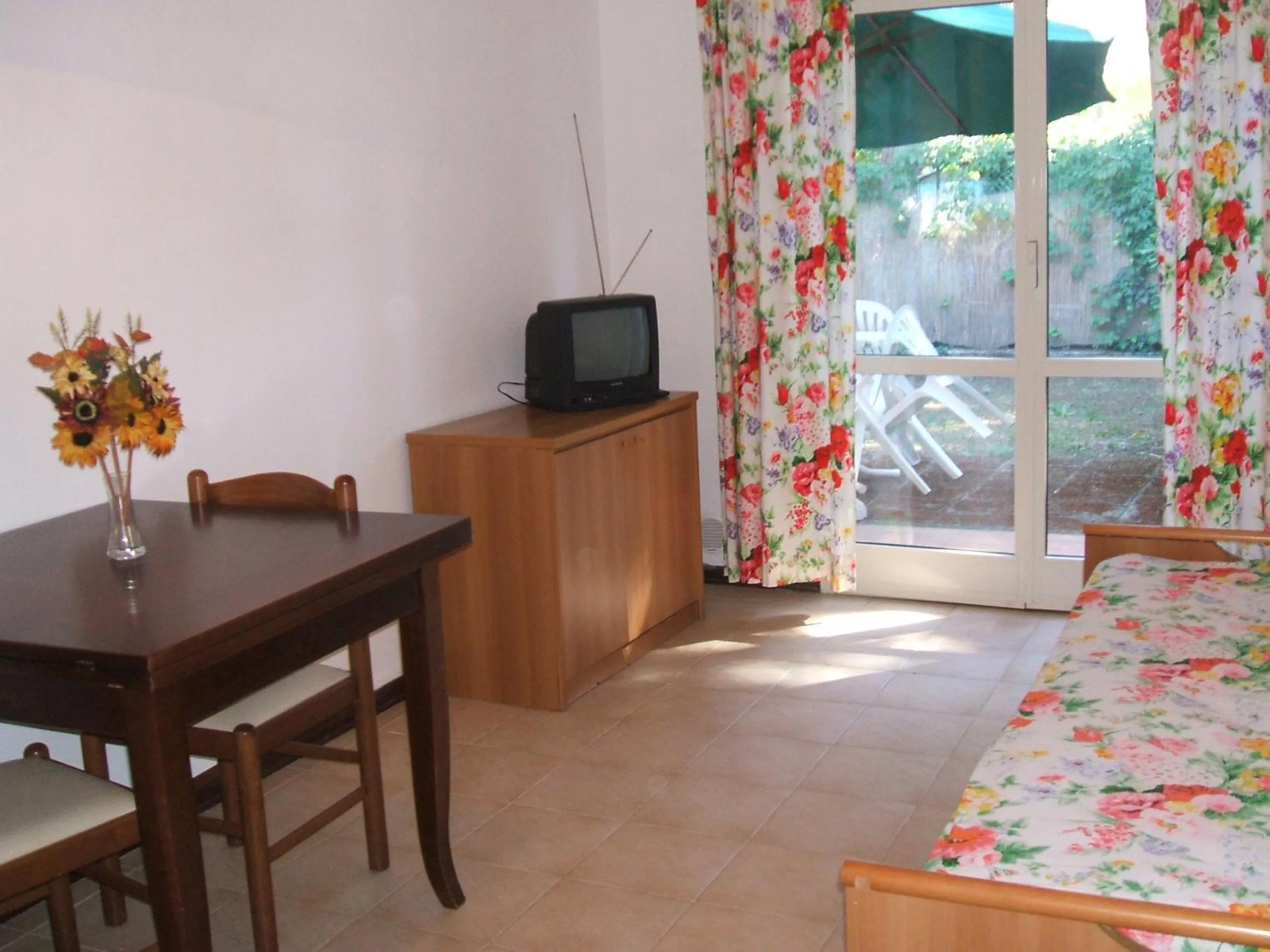 Living room, Bed in Residence Airone