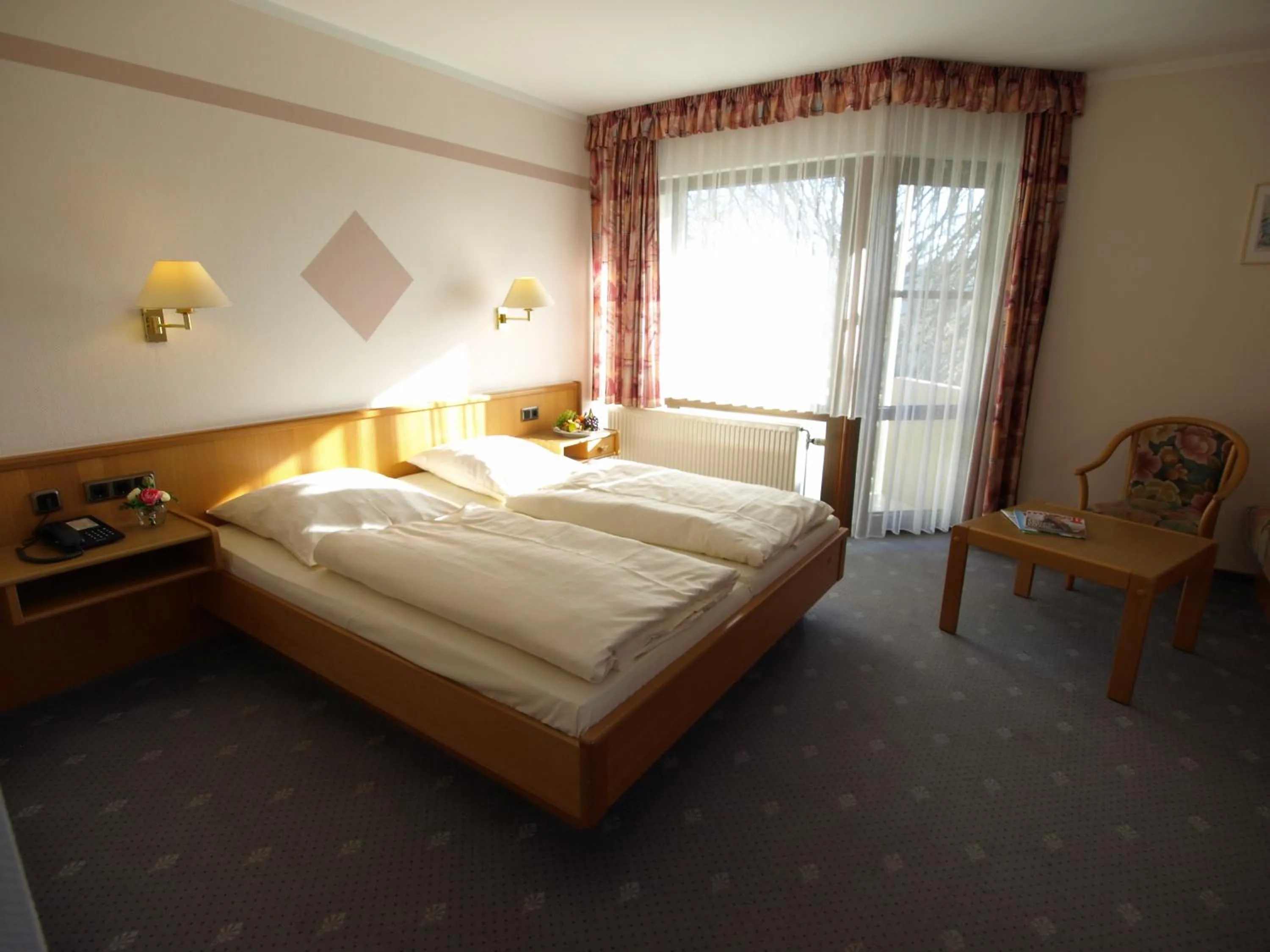 Photo of the whole room, Bed in Hotel Landhaus Silbertanne