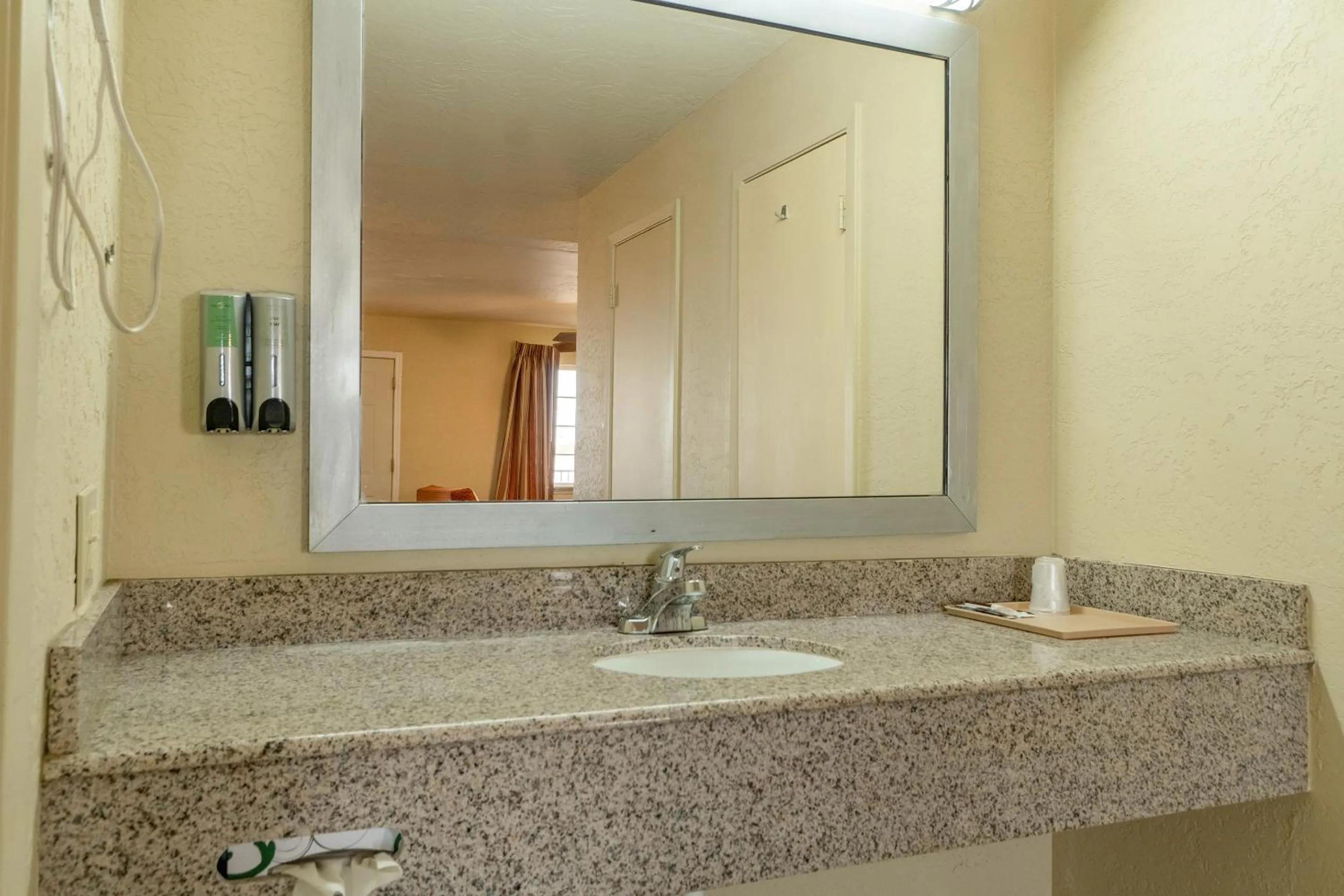 Bathroom in Stamford Inn By OYO