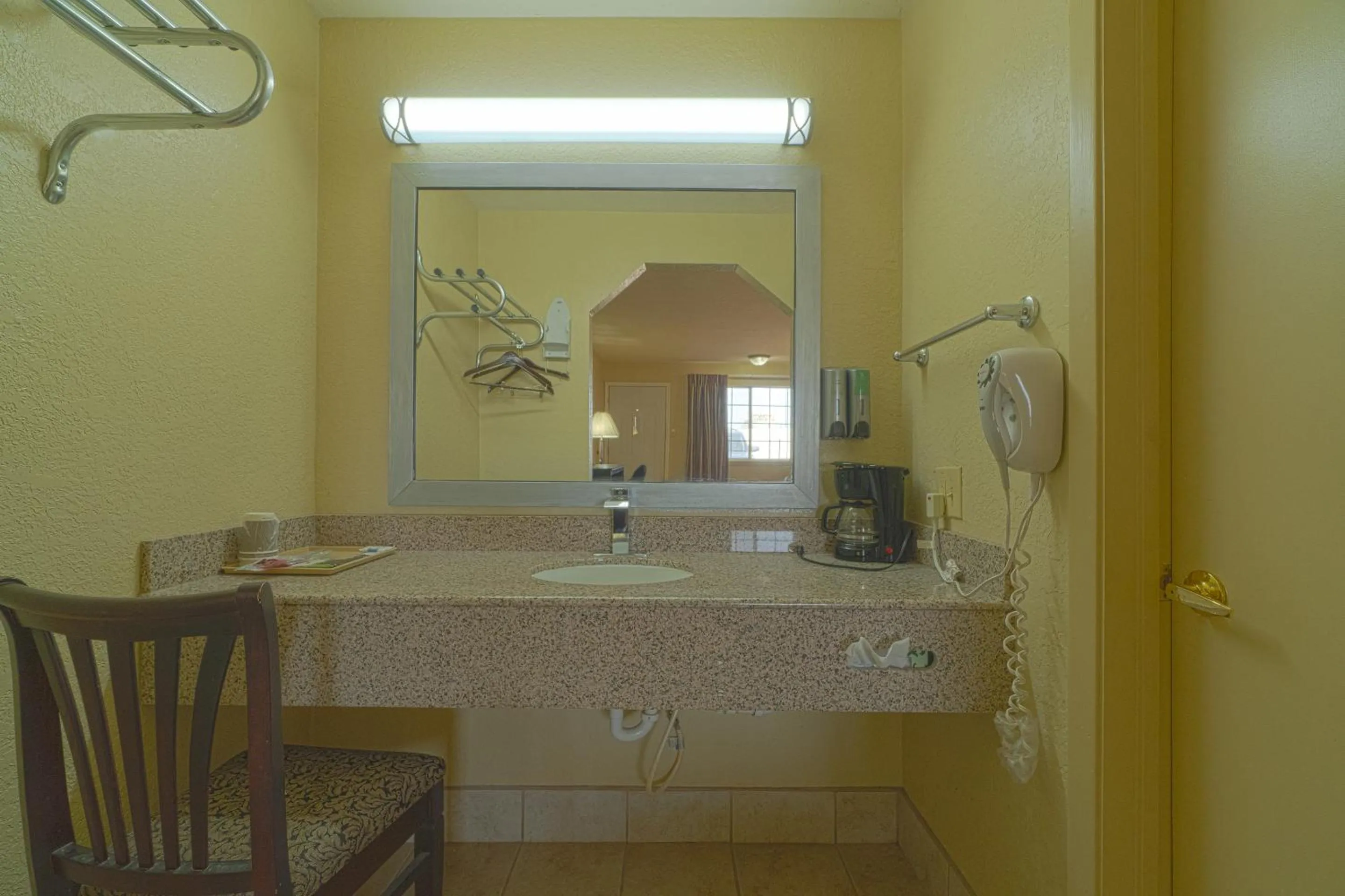 Bathroom in Stamford Inn By OYO