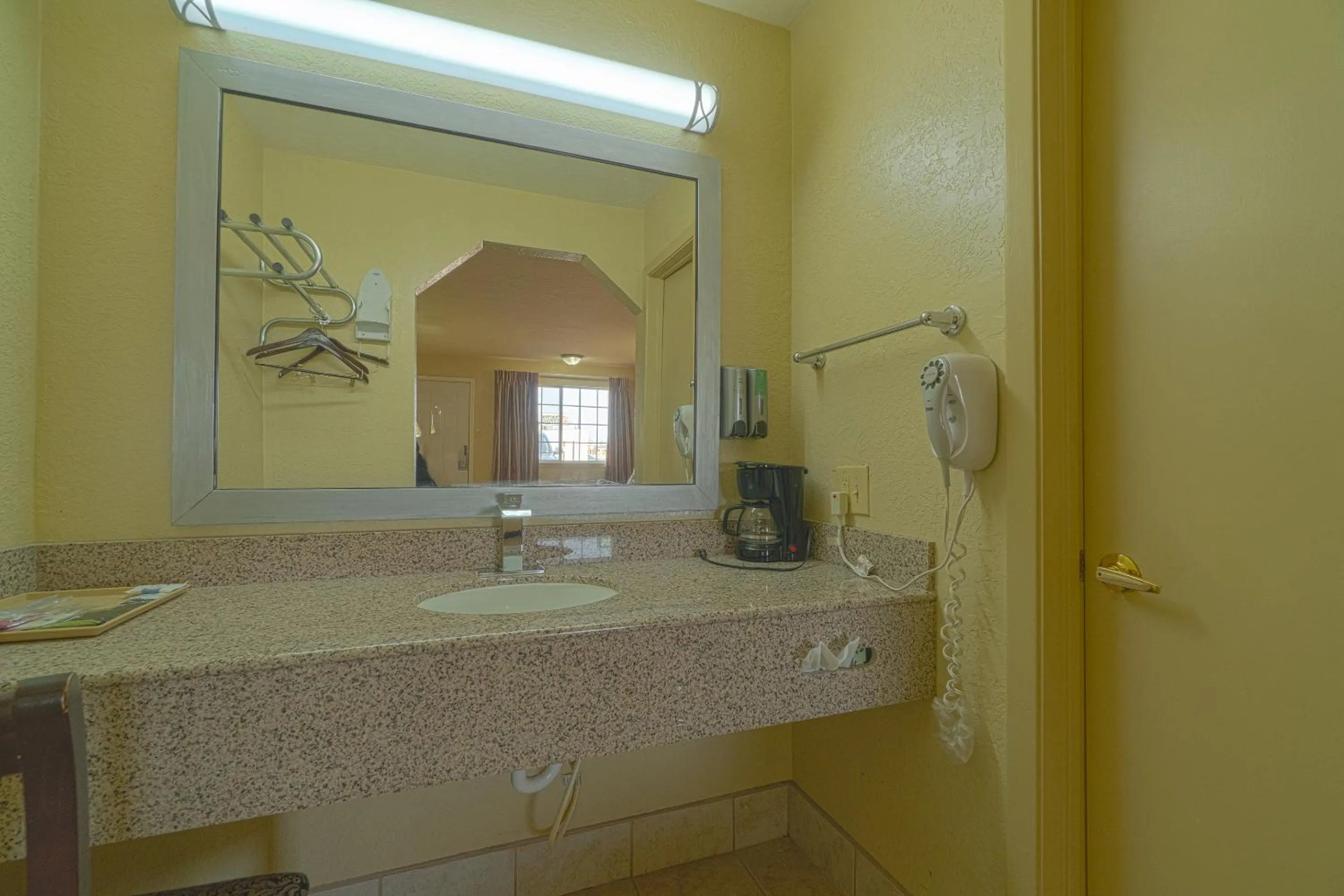 Bathroom in Stamford Inn By OYO