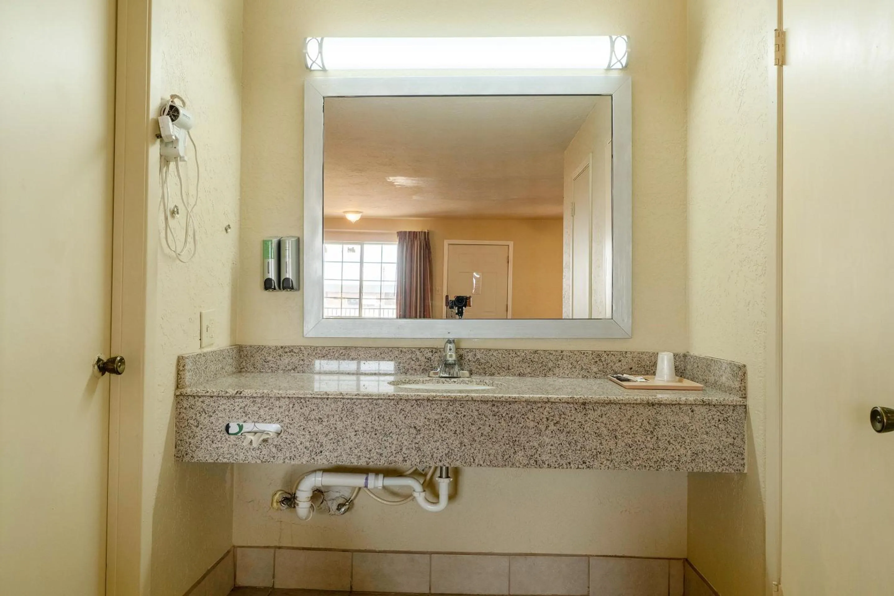 Bathroom in Stamford Inn By OYO