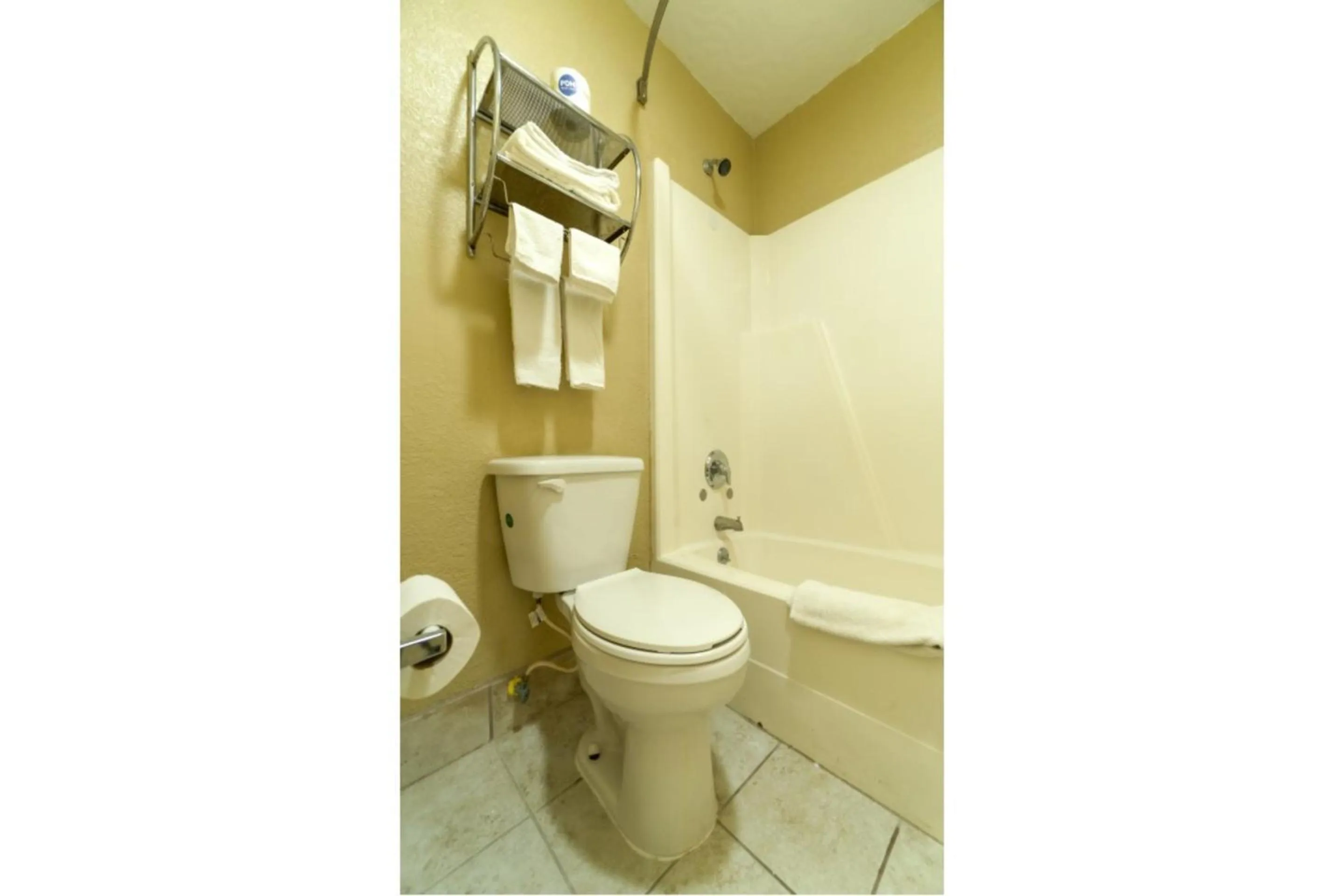 Bathroom in Stamford Inn By OYO