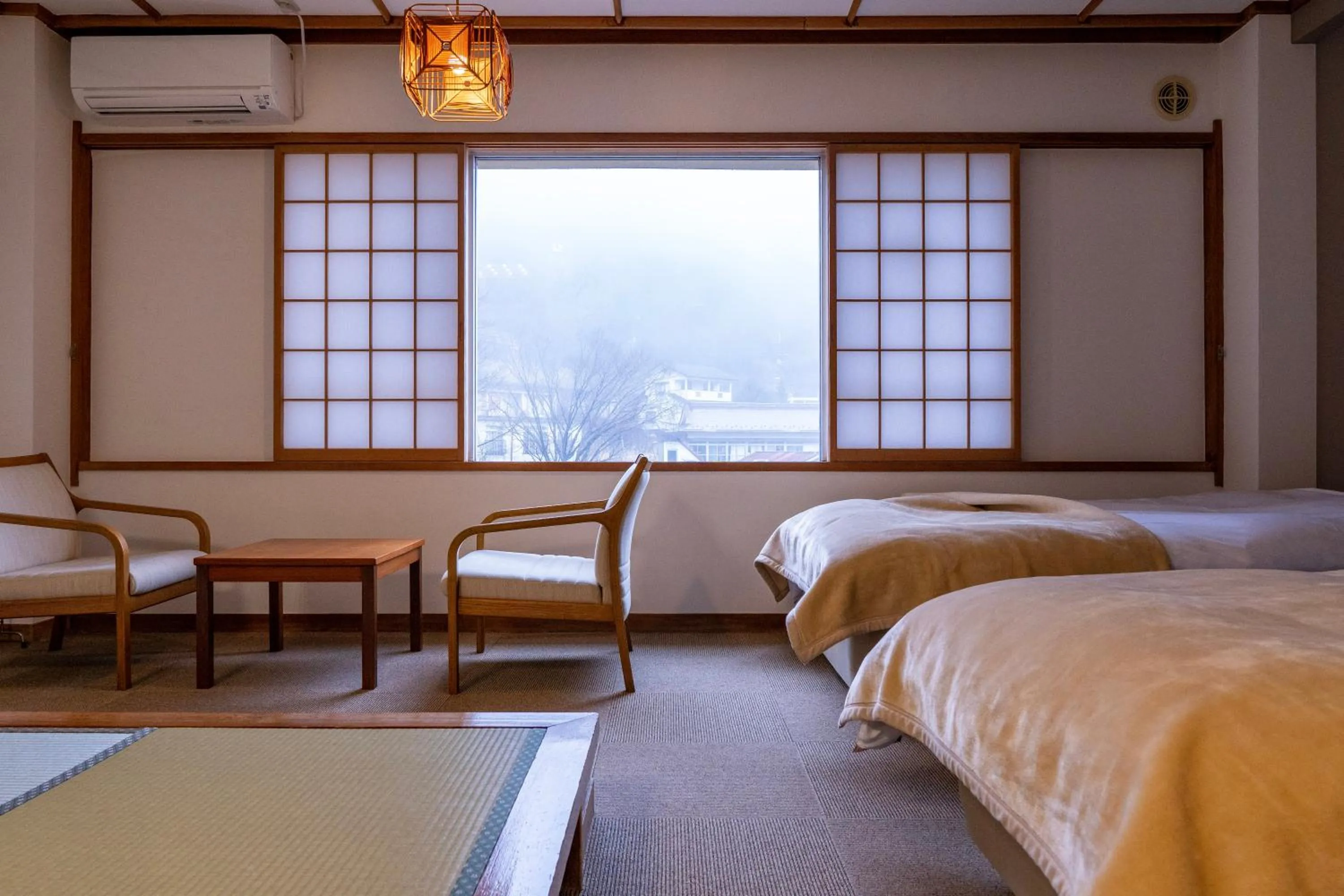 Bed in YUMORI ONSEN HOSTEL