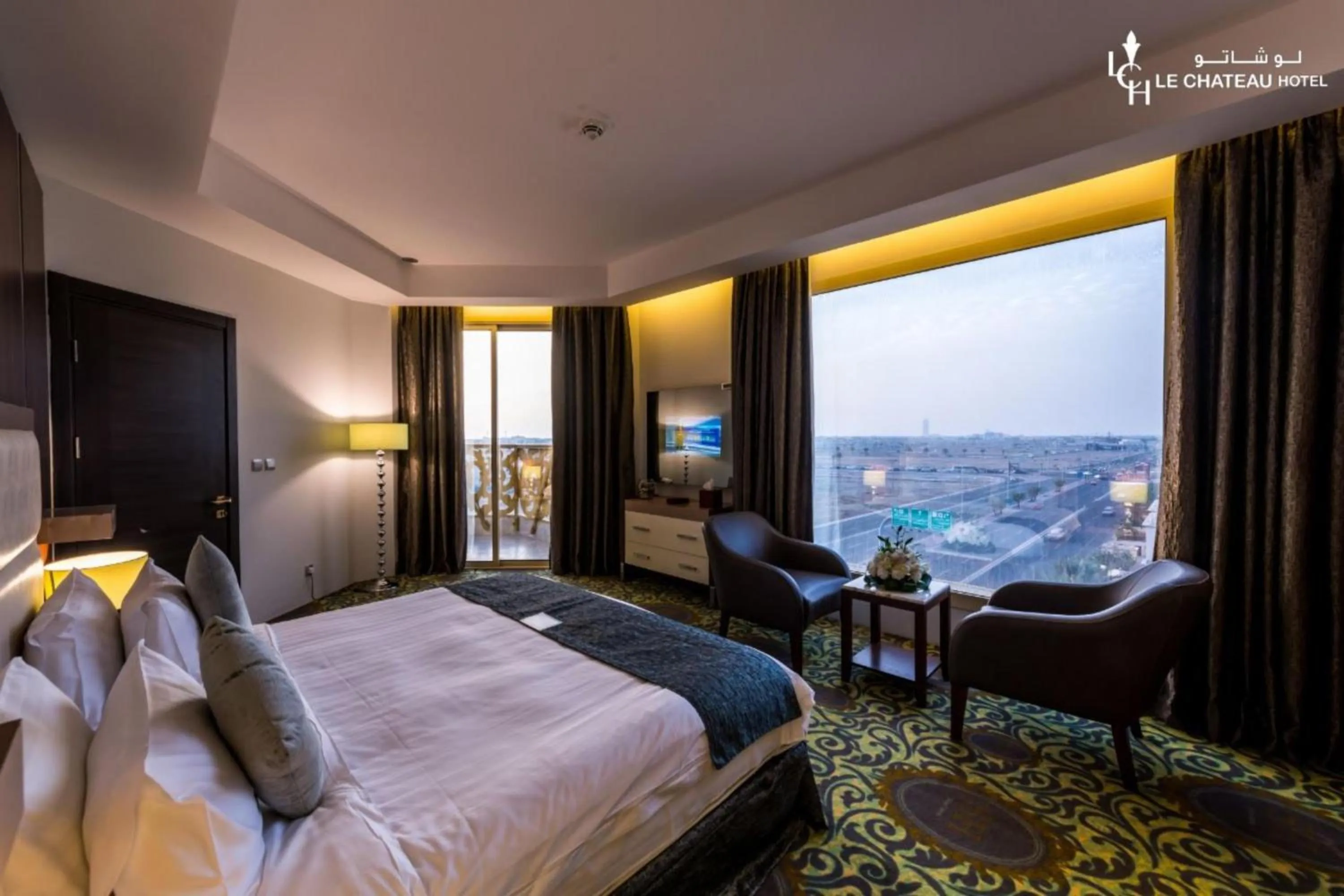 Bed in LeChateau Boutique Hotel