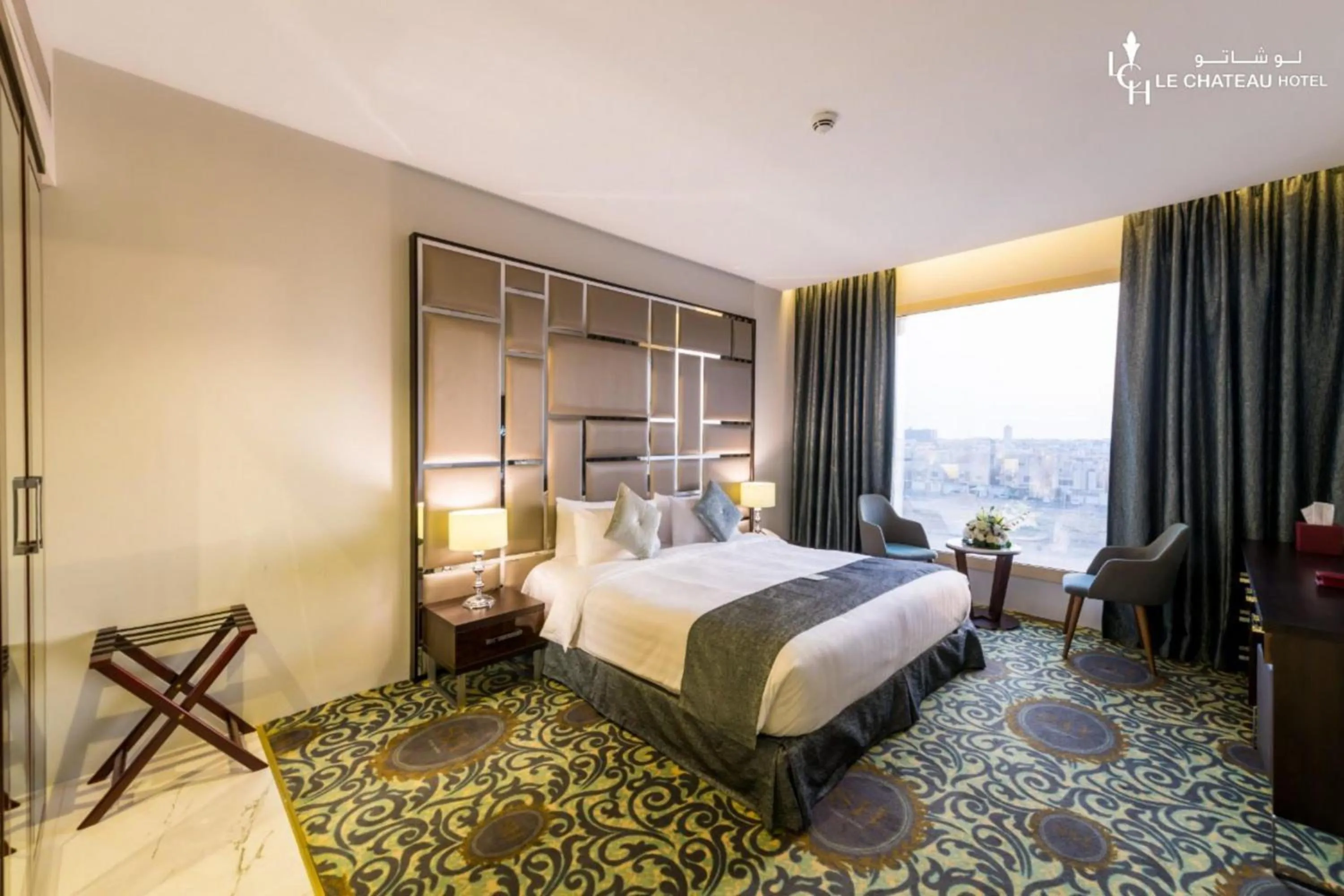 Bed in LeChateau Boutique Hotel