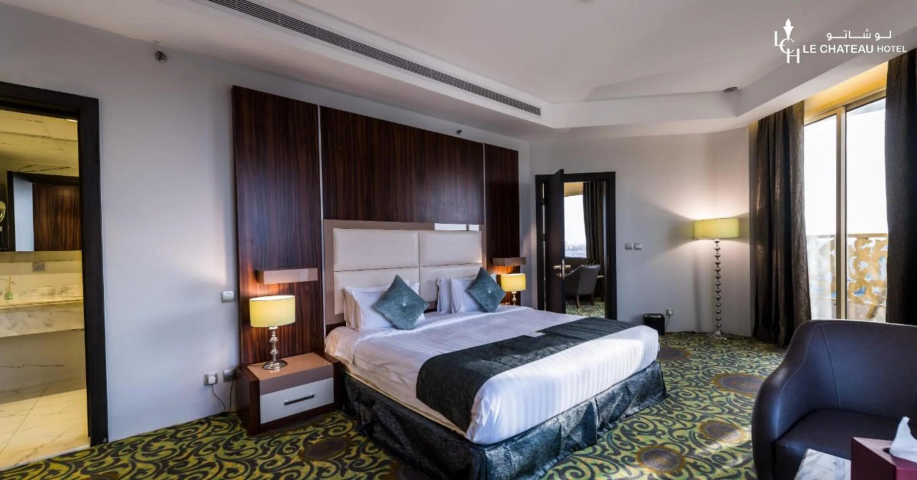 Bed in LeChateau Boutique Hotel