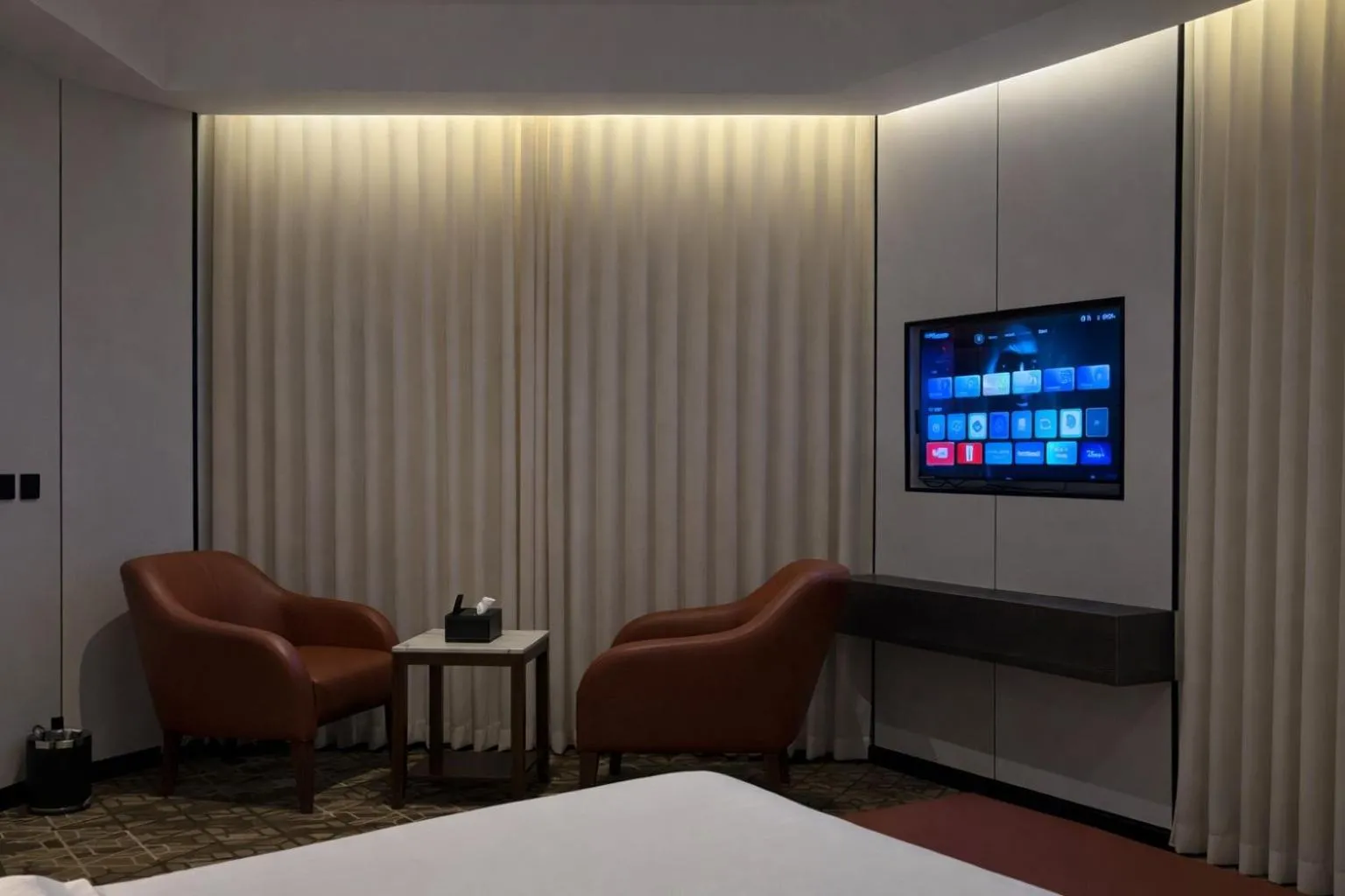 Bed in LeChateau Boutique Hotel