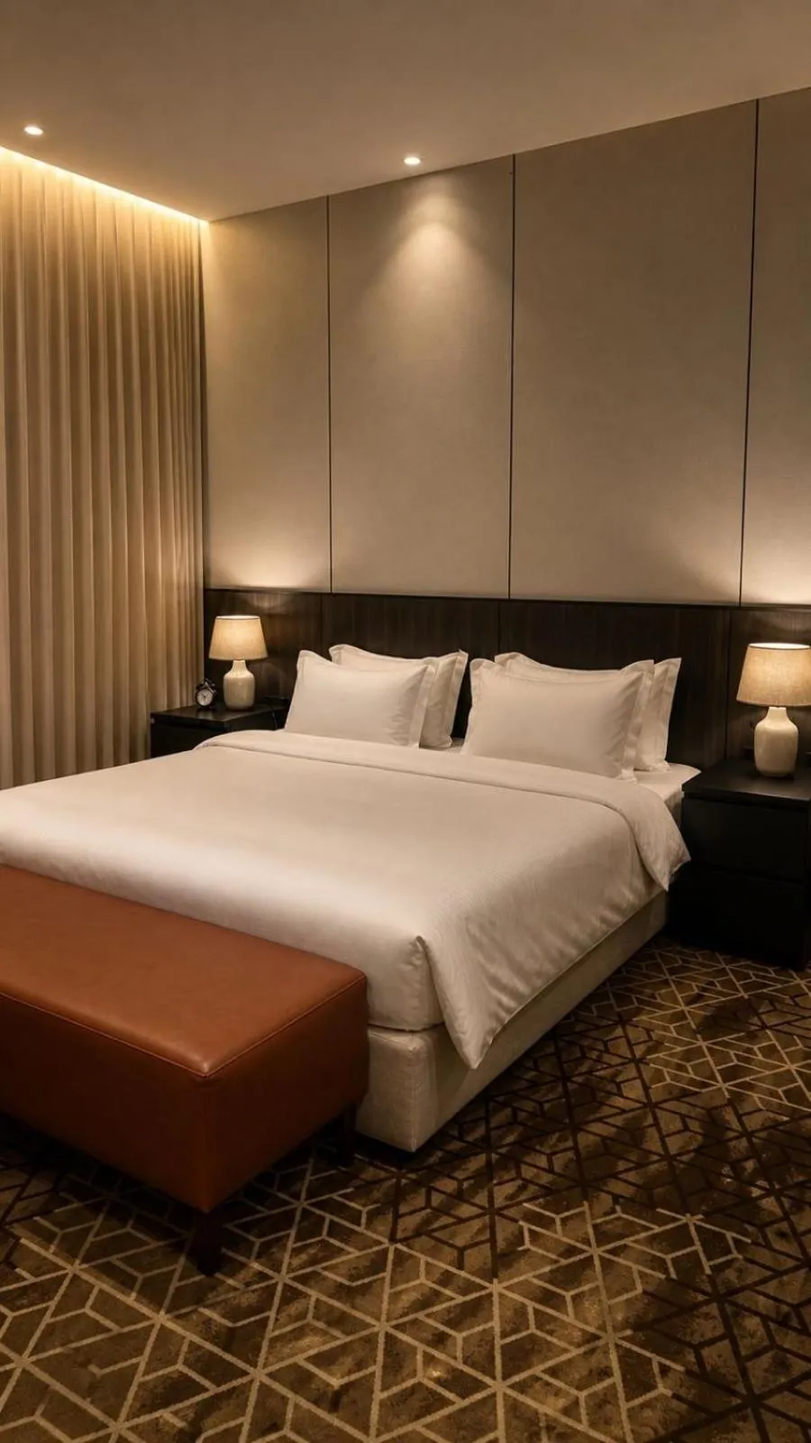 Bed in LeChateau Boutique Hotel