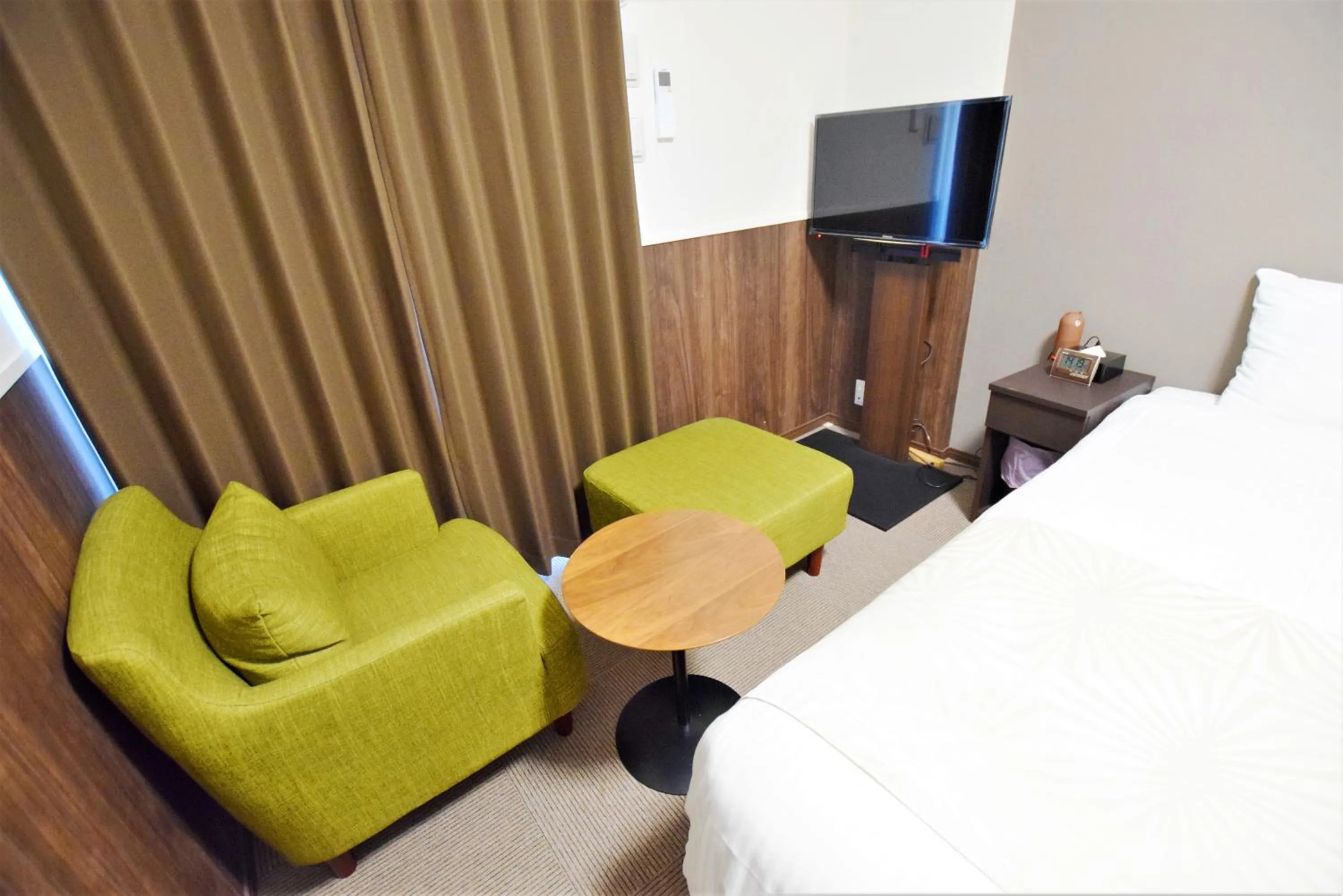 Living room, Bed in Randor Hotel Fukuoka