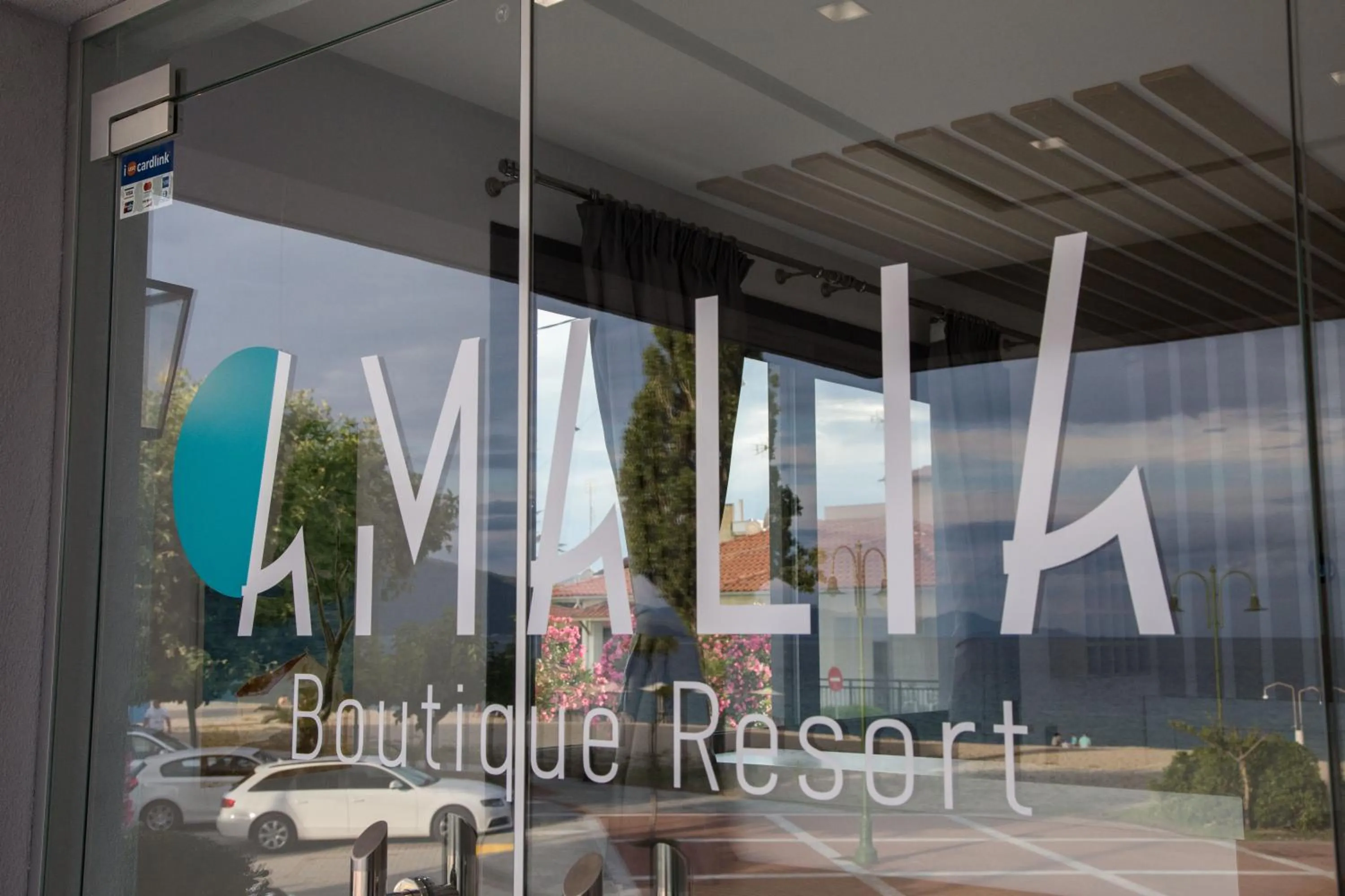 Property logo or sign in Amalia Rooms Sea View