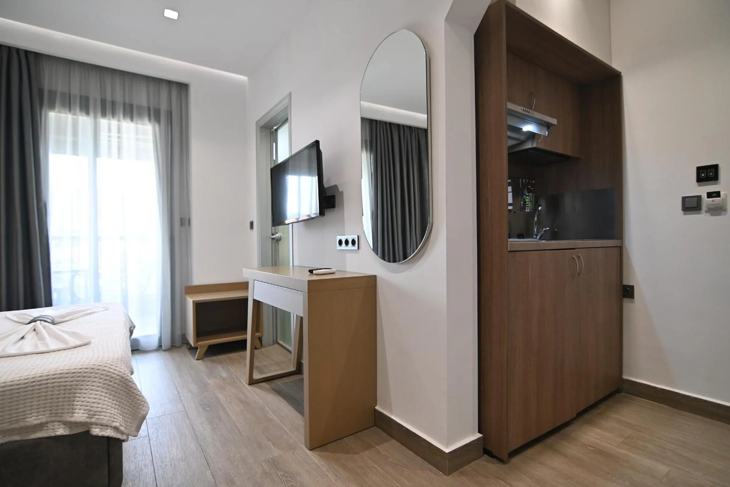 Bed in Amalia Rooms Sea View