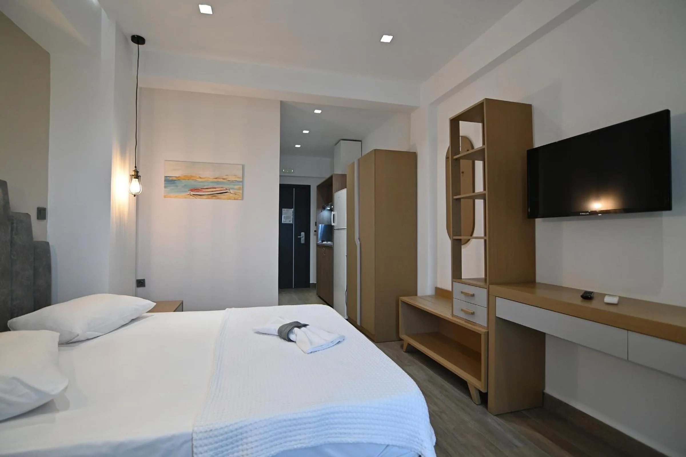 Bed in Amalia Rooms Sea View