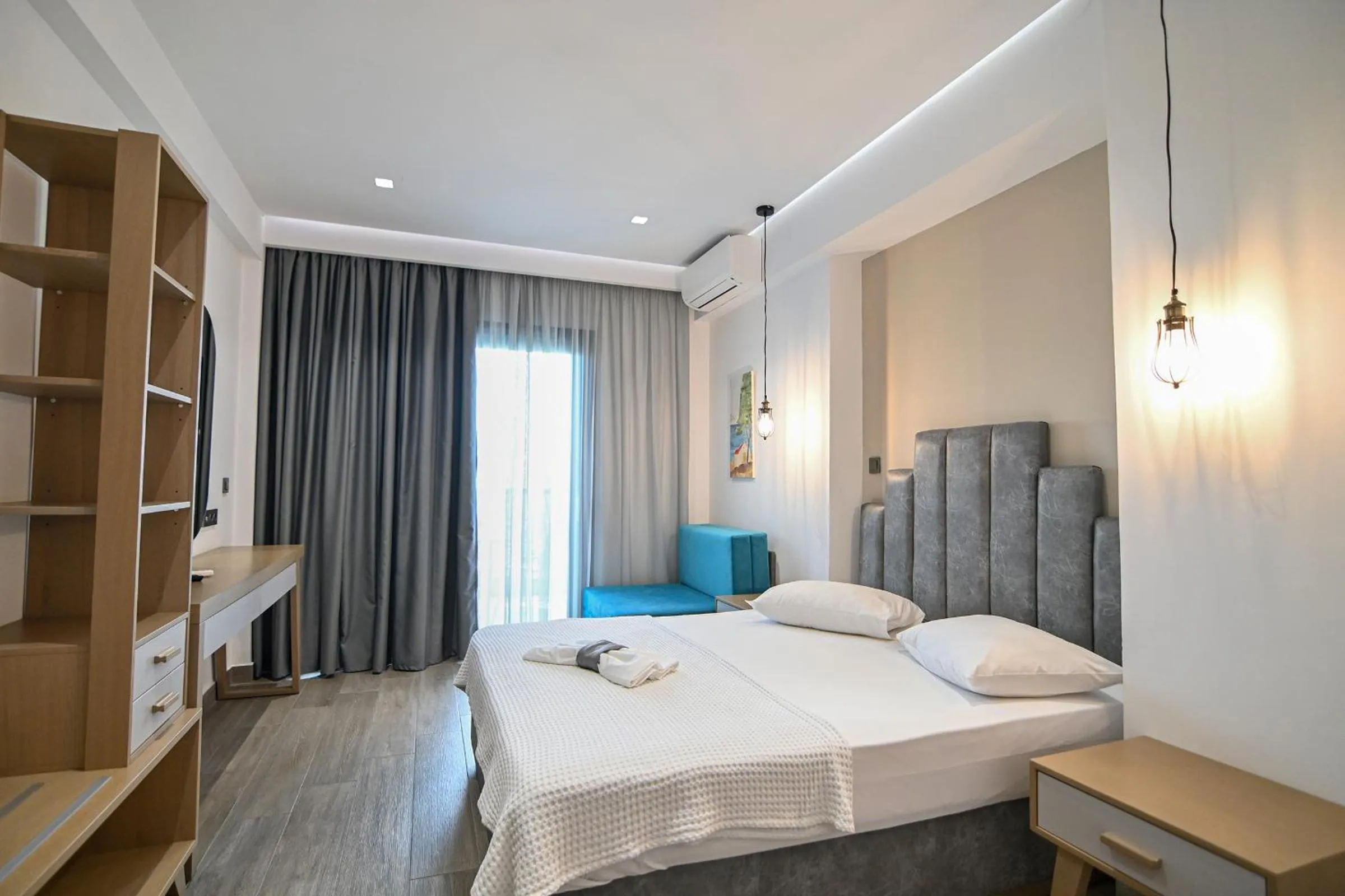 Bed in Amalia Rooms Sea View