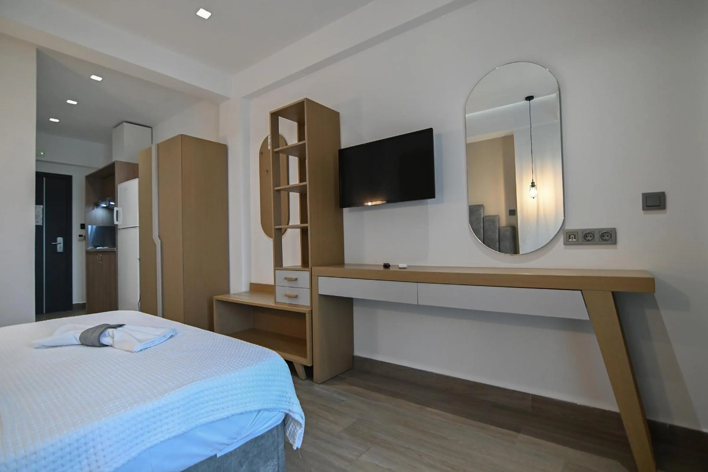 Bed in Amalia Rooms Sea View