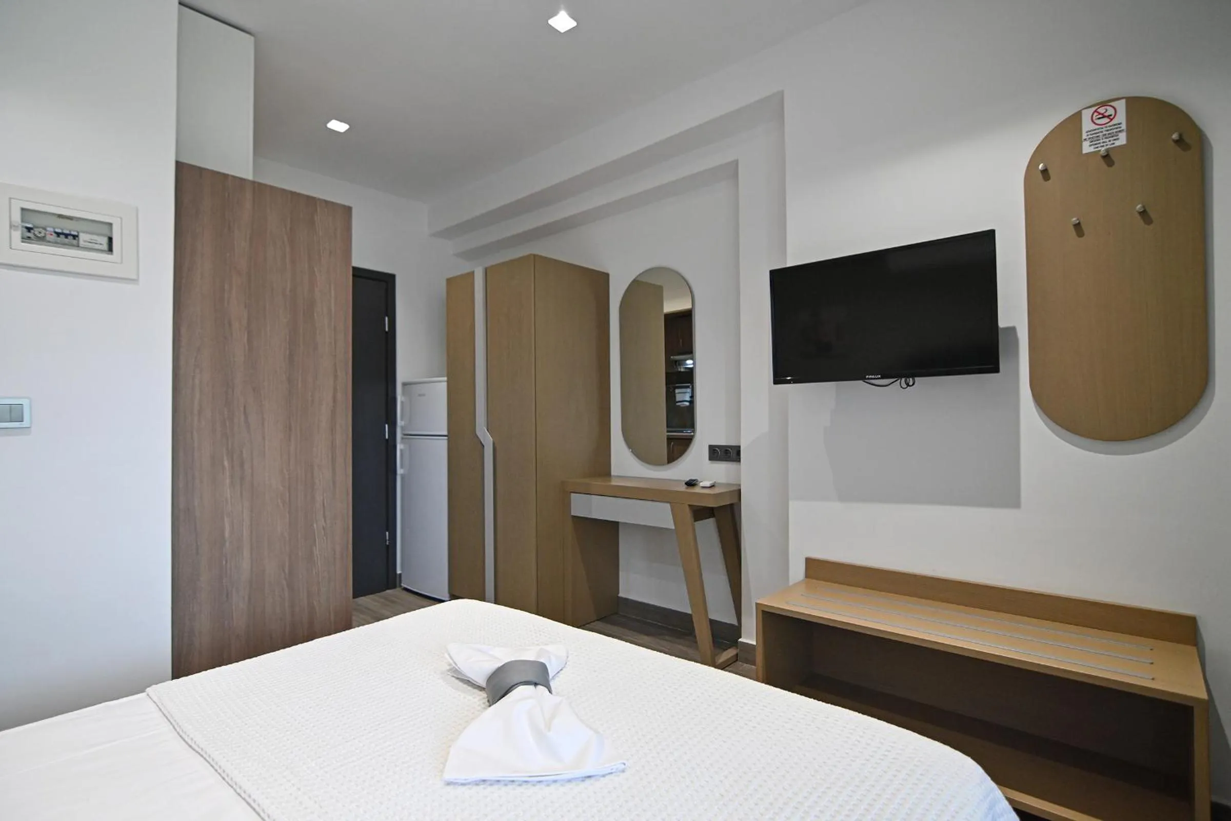 Bed in Amalia Rooms Sea View