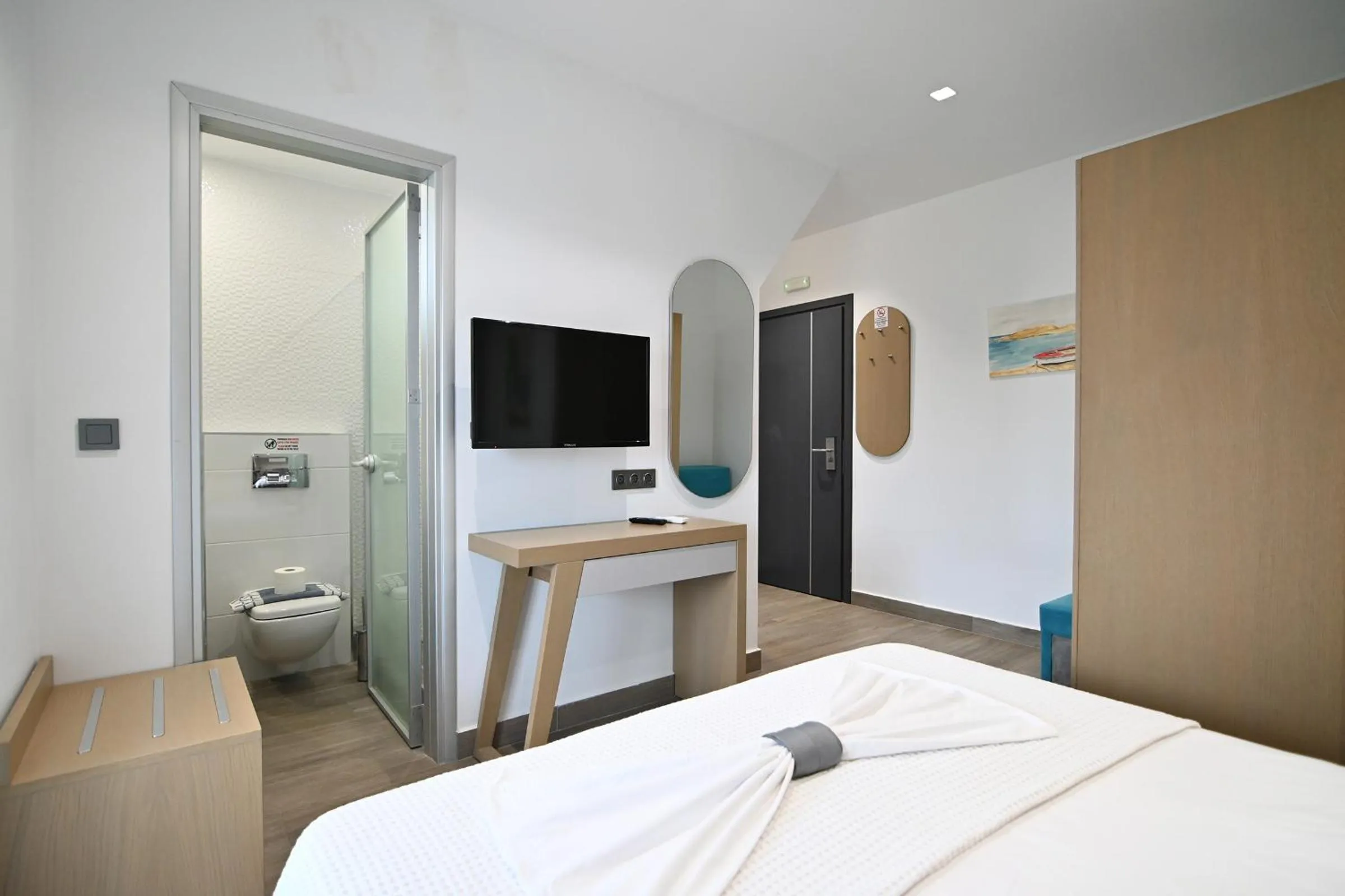 Bed in Amalia Rooms Sea View