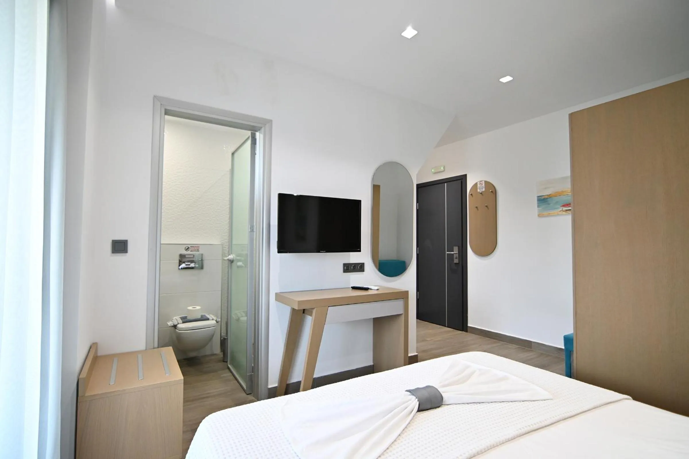 Bed in Amalia Rooms Sea View