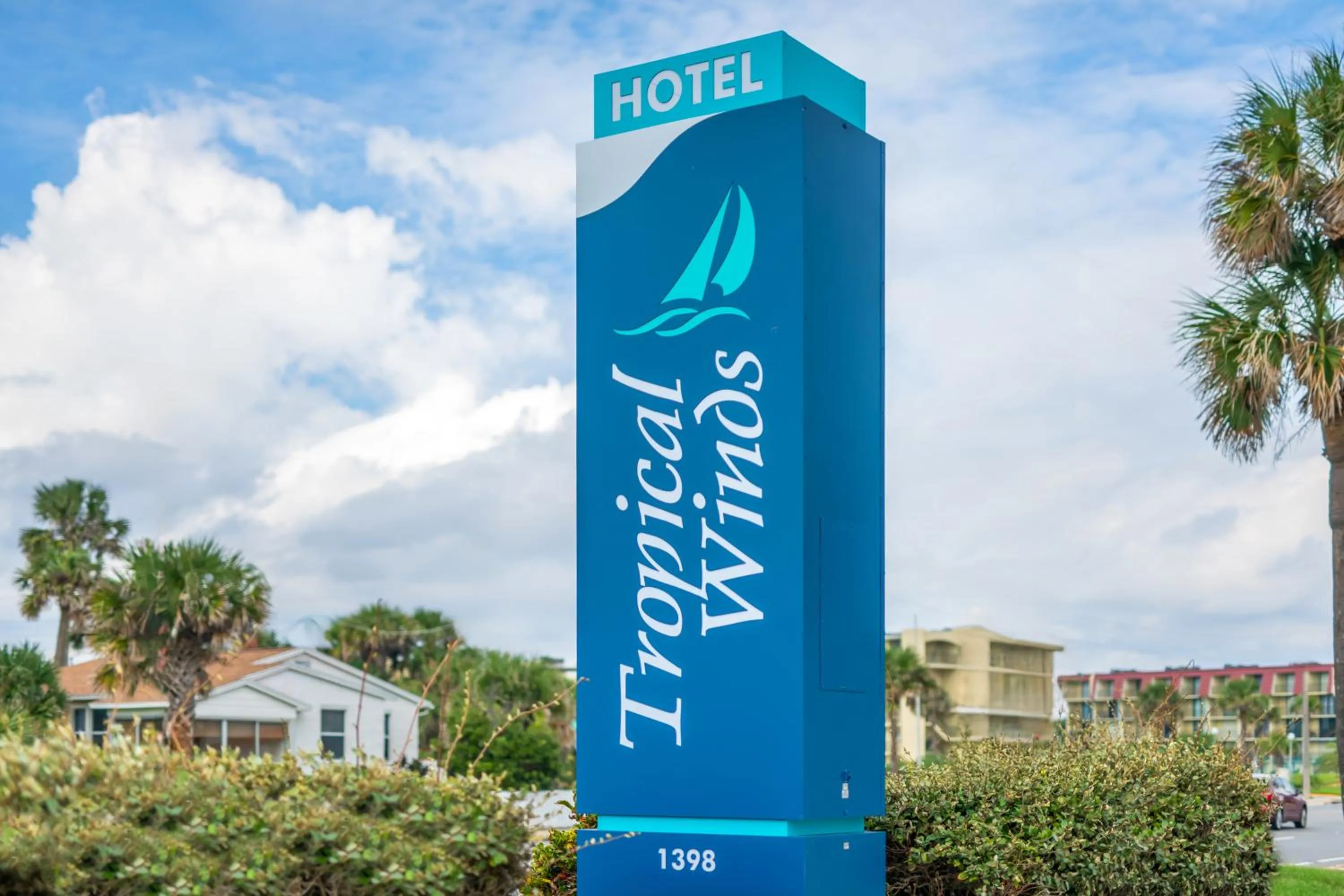Property logo or sign in Tropical Winds Resort Hotel