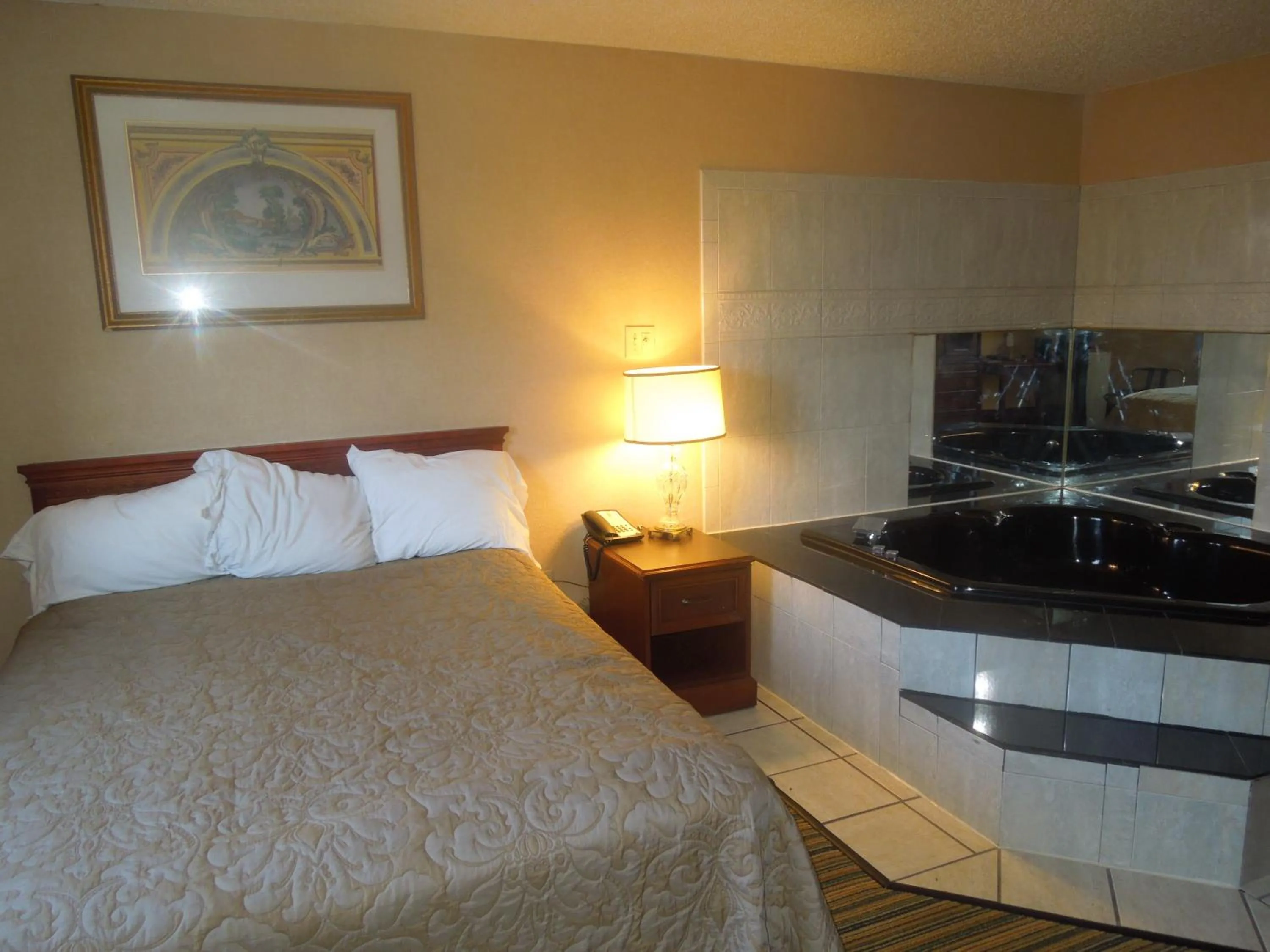 Bed in Super 8 by Wyndham Waldorf