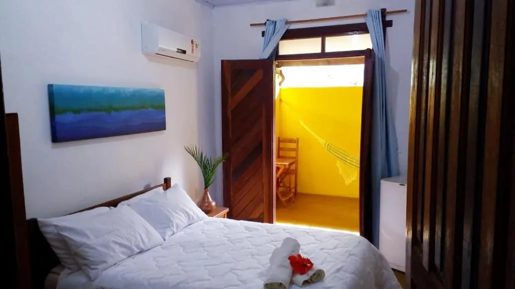 Bed in Pousada Corais Do Sul