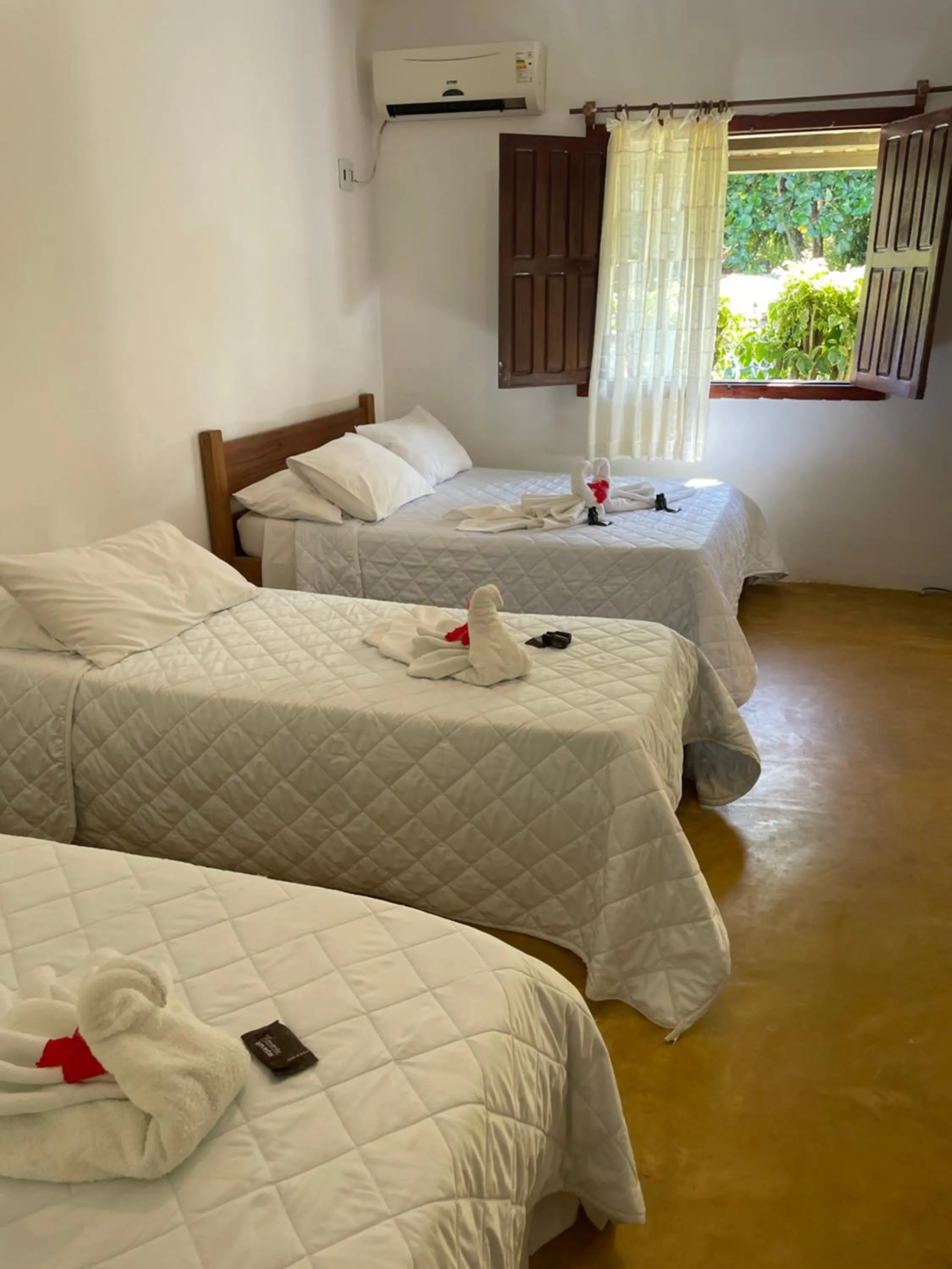 Bed in Pousada Corais Do Sul