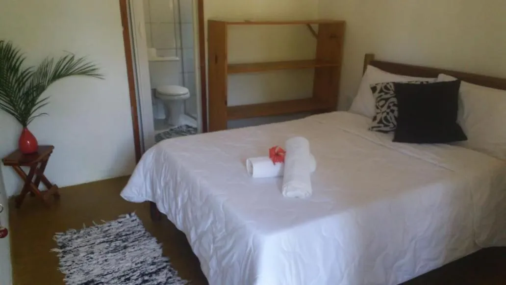 Bed in Pousada Corais Do Sul