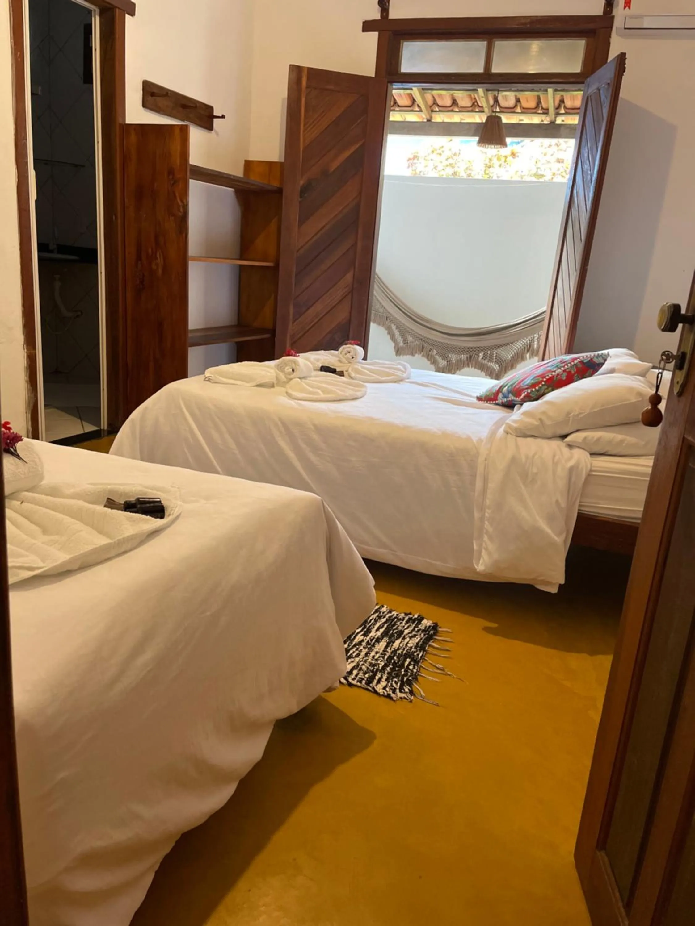 Bed in Pousada Corais Do Sul