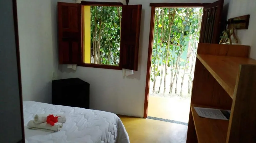 Bed in Pousada Corais Do Sul