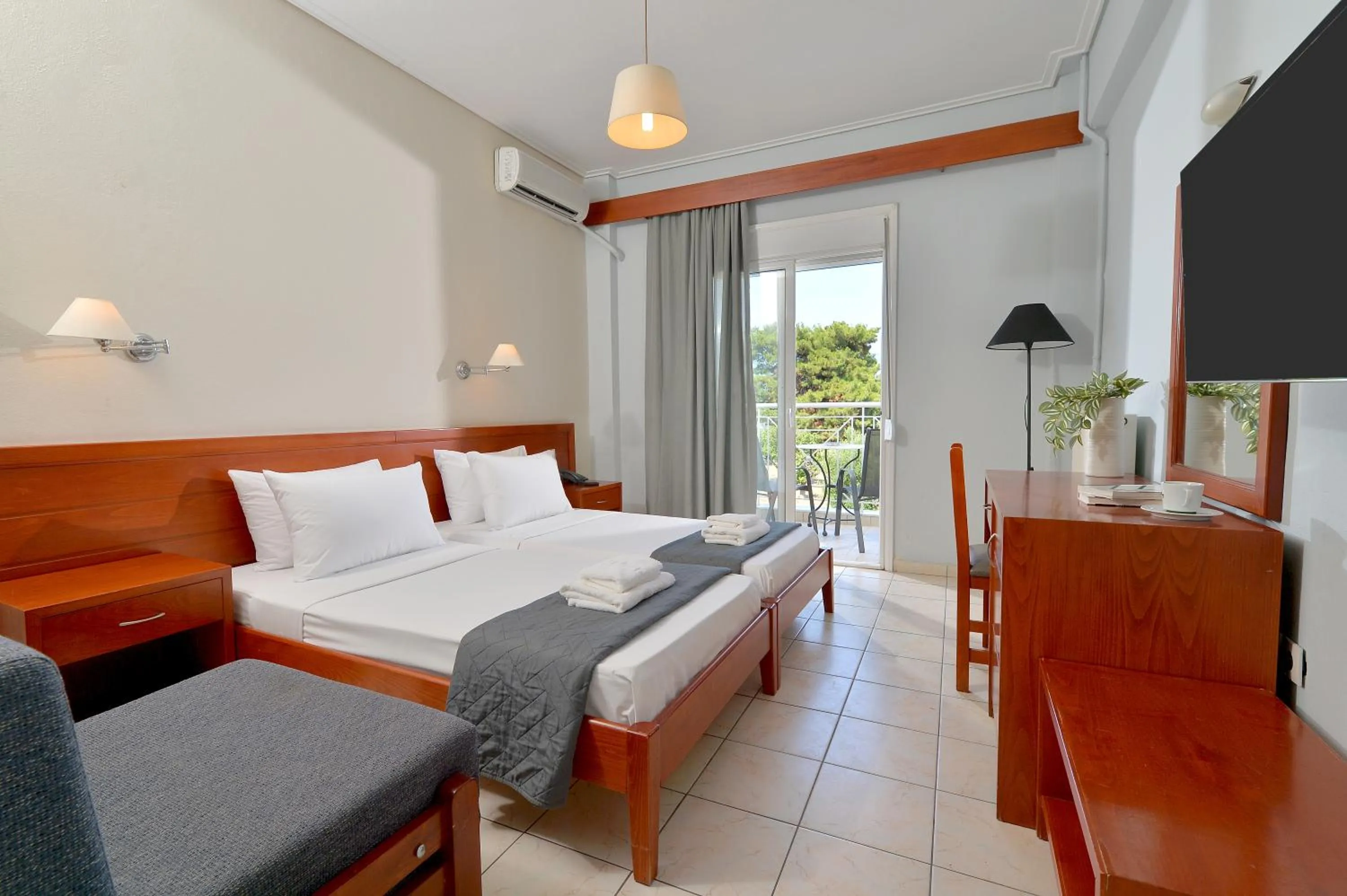 Bed in Hotel Kalloni