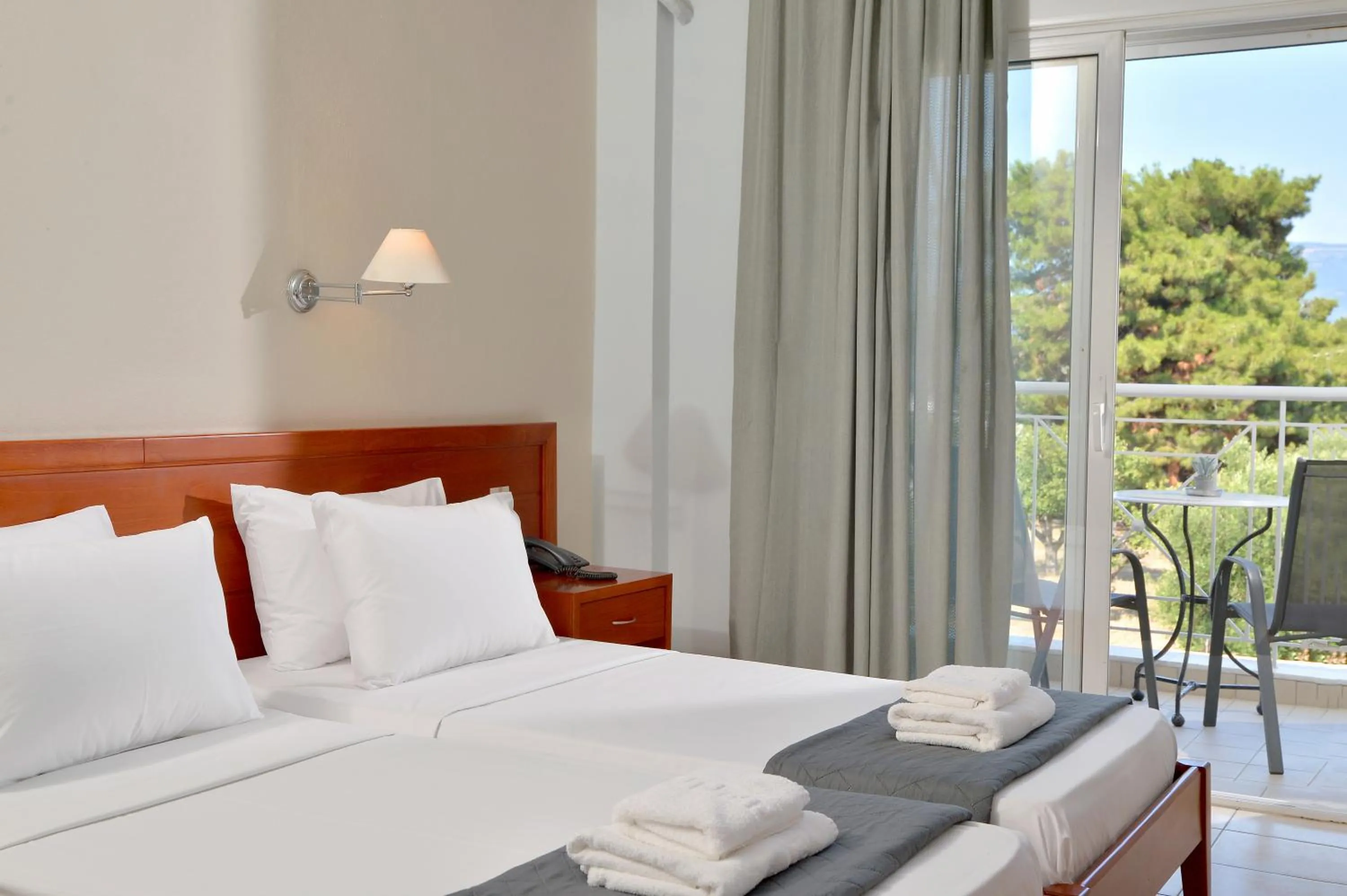 View (from property/room), Bed in Hotel Kalloni