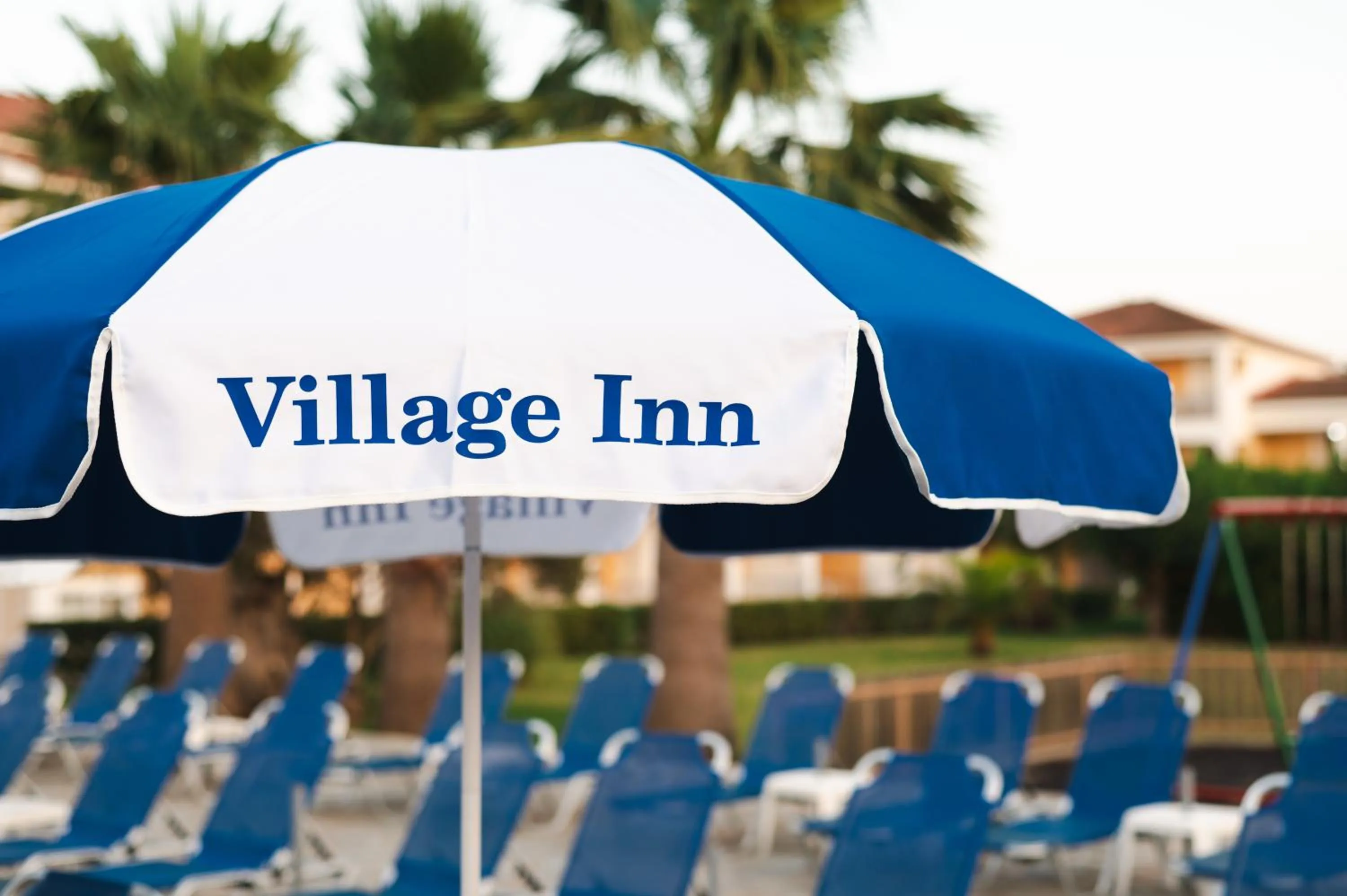 Swimming pool in Village Inn Studios & Family Apartments