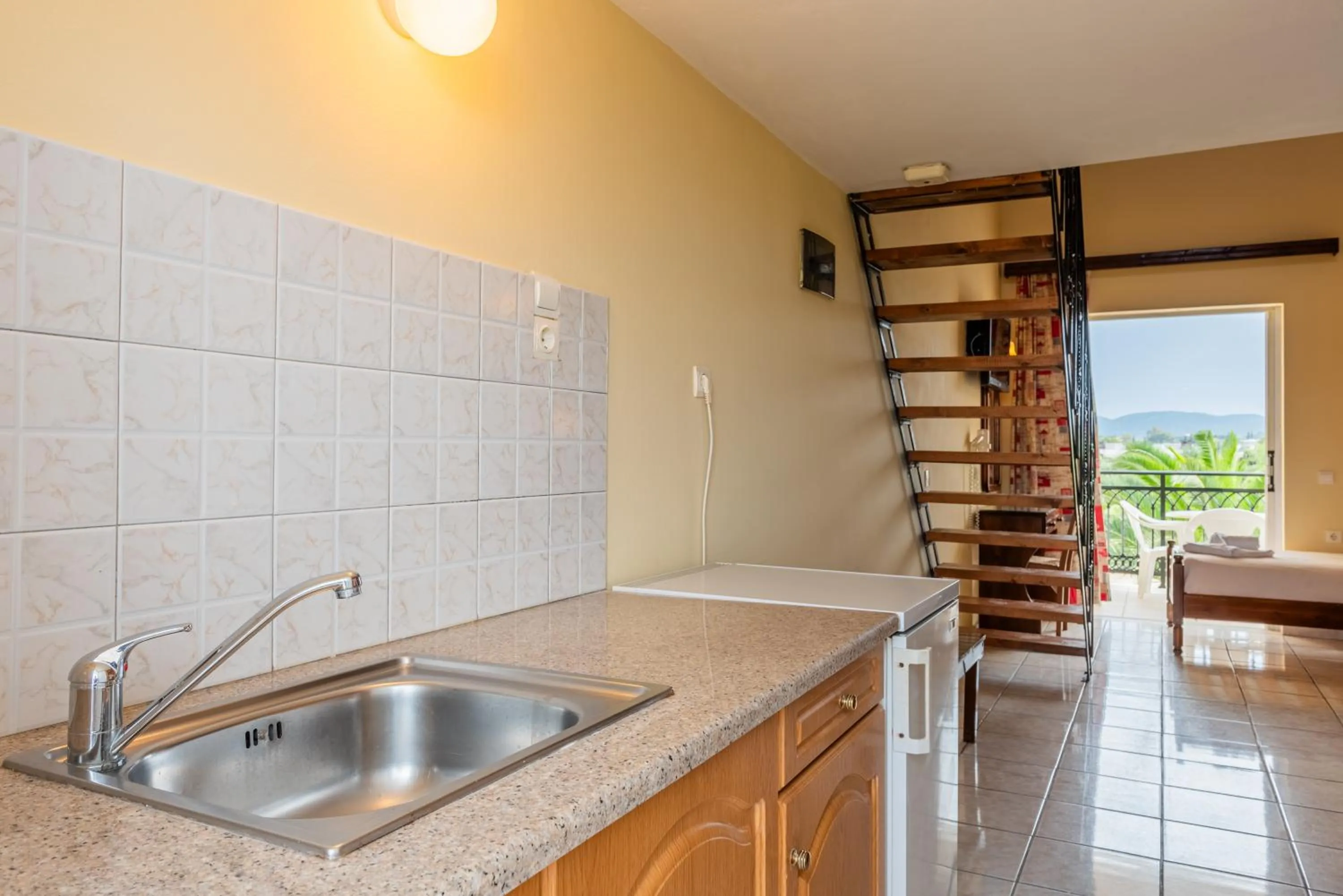 Kitchen or kitchenette in Village Inn Studios & Family Apartments
