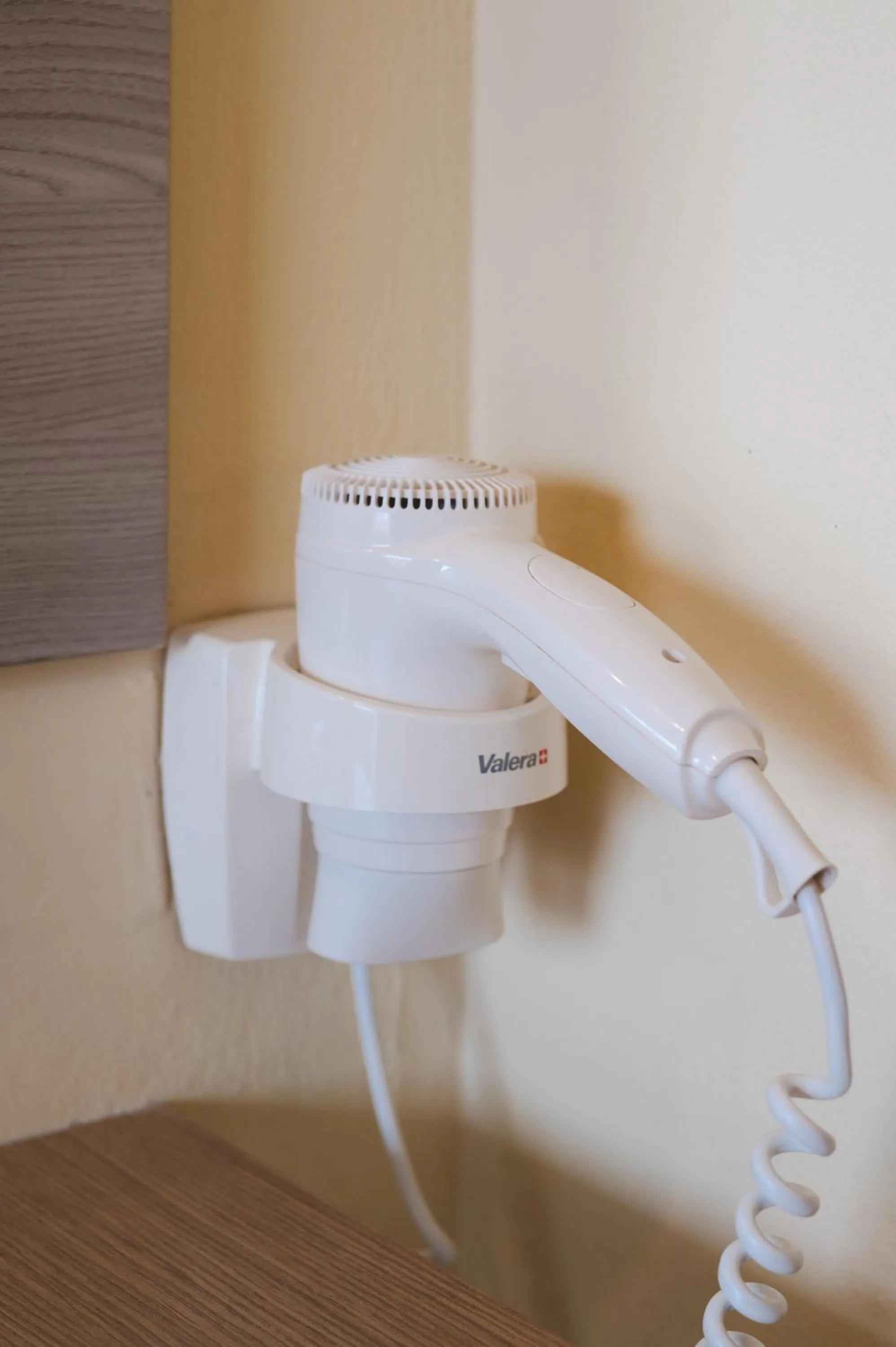 hair dryier in Village Inn Studios & Family Apartments