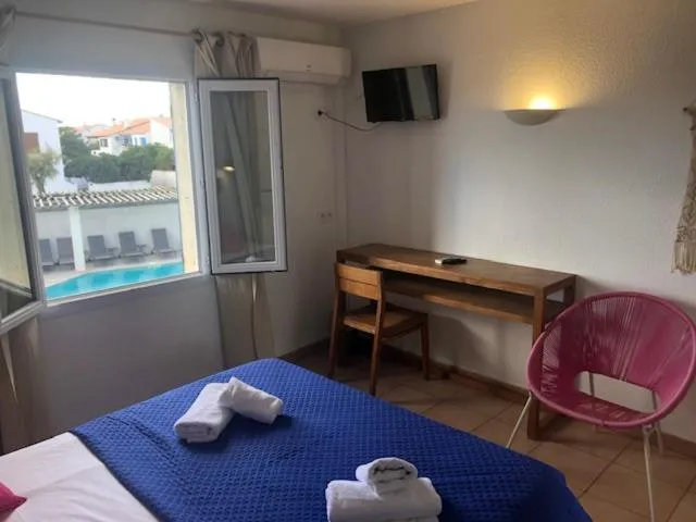 Bed in Hotel Le Bleu Marine