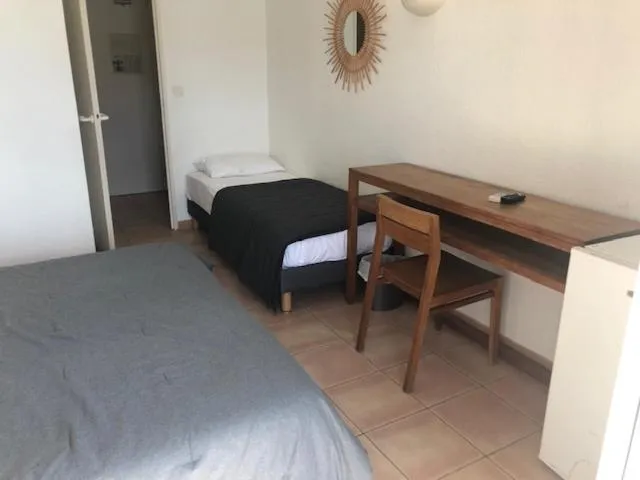 Bed in Hotel Le Bleu Marine