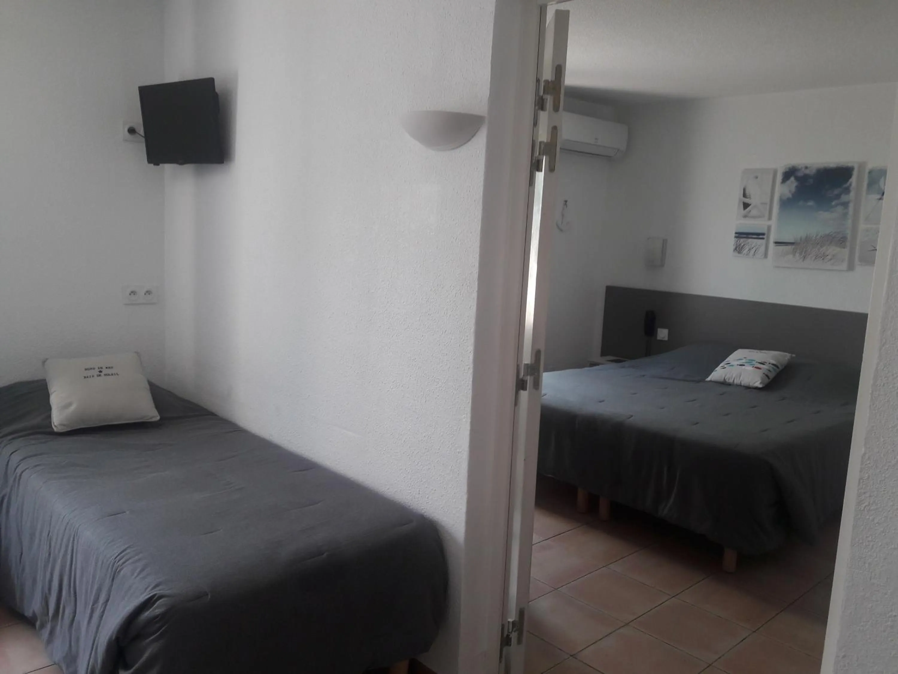 Bed in Hotel Le Bleu Marine