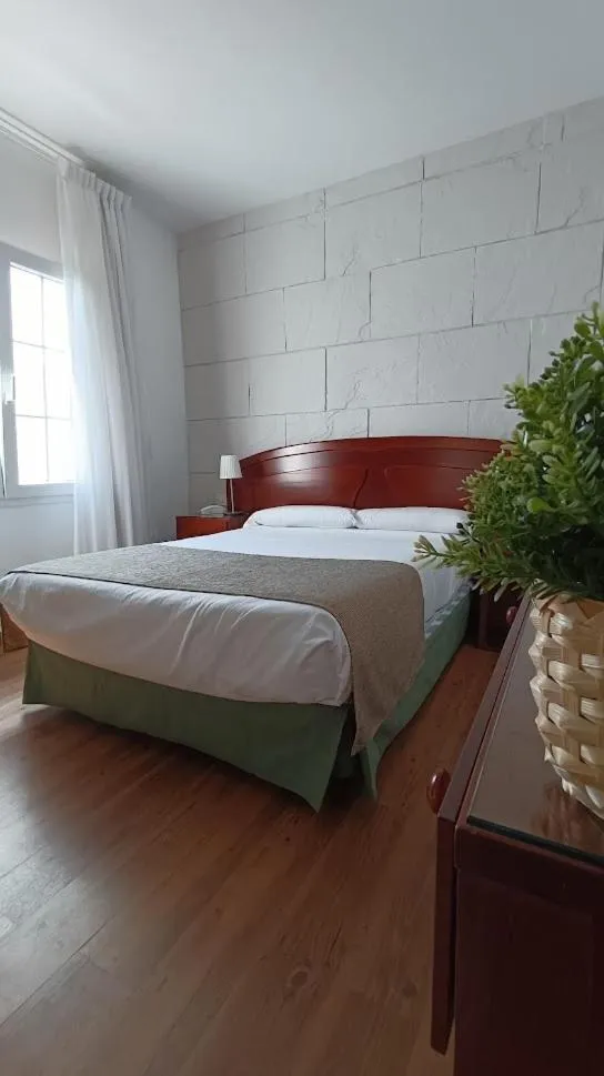 Bed in Hotel Boomerang