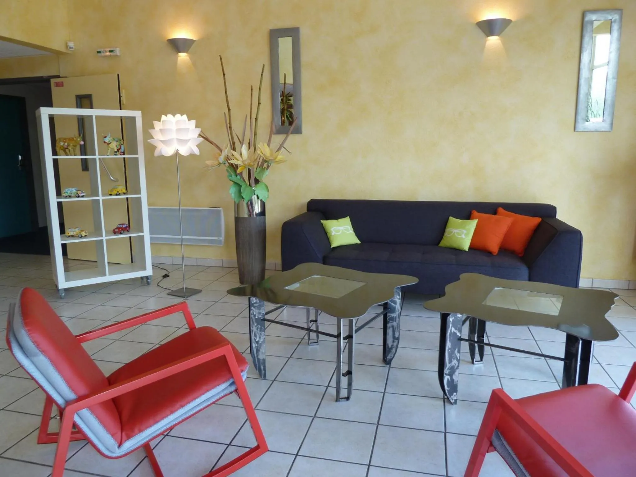 Communal lounge/ TV room in Hôtel La Colombiere Cantal