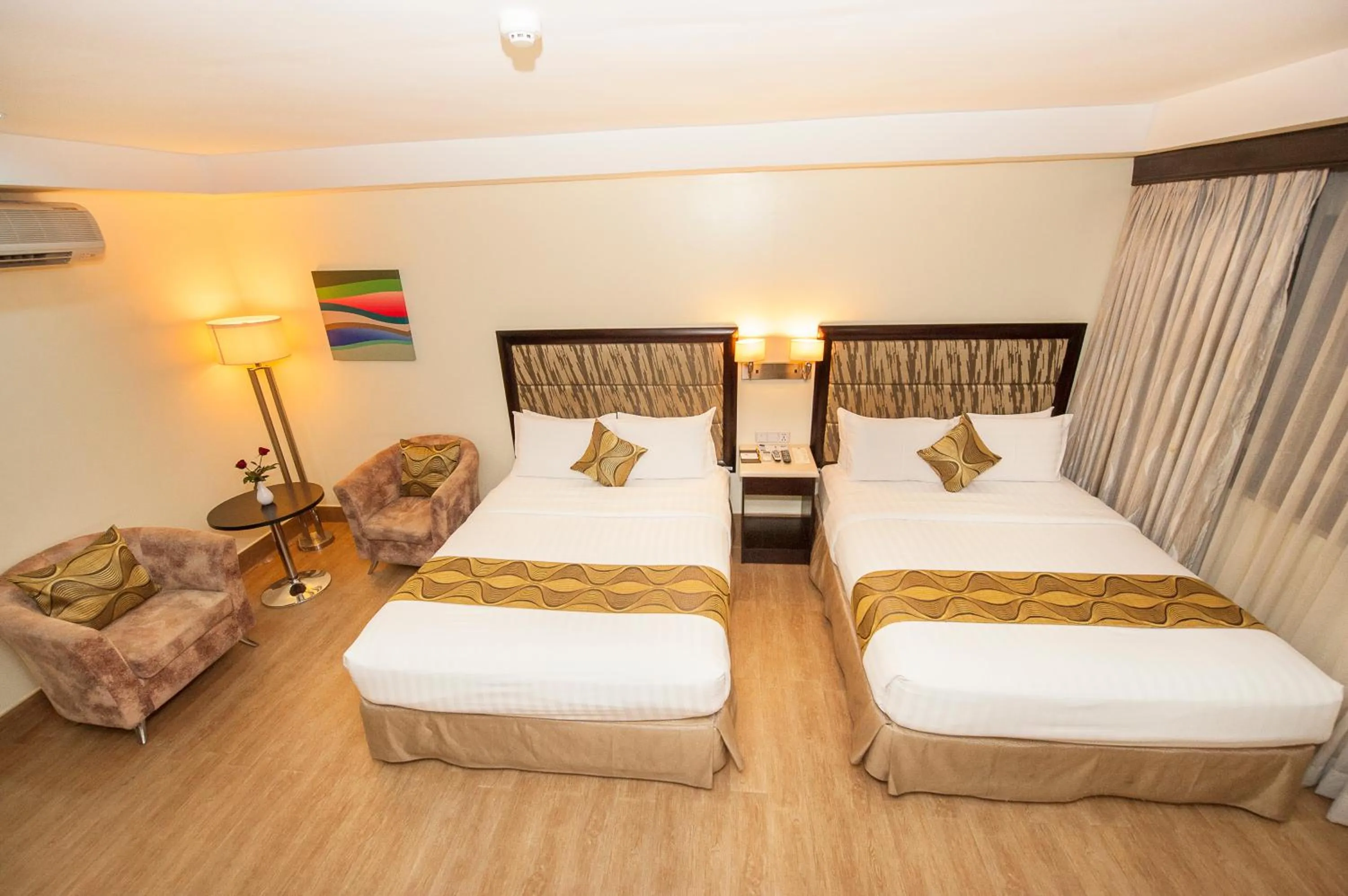 Toilet, Bed in Diamond Suites and Residences