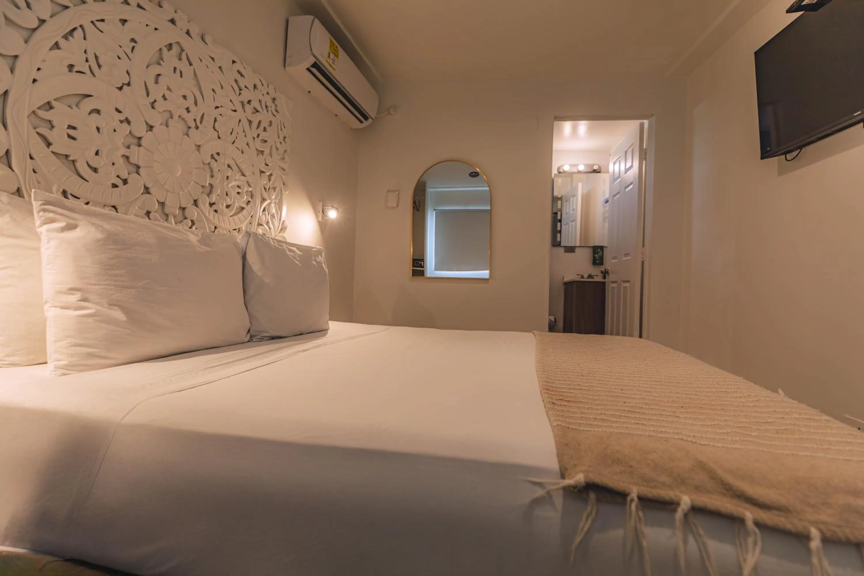 Bed in Ataraxy Hotel Boutique