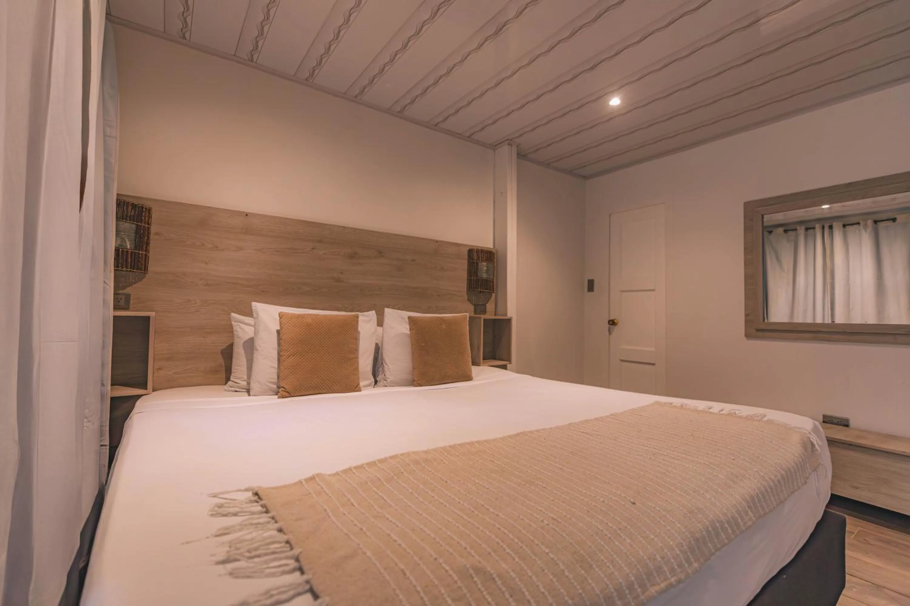 Bed in Ataraxy Hotel Boutique