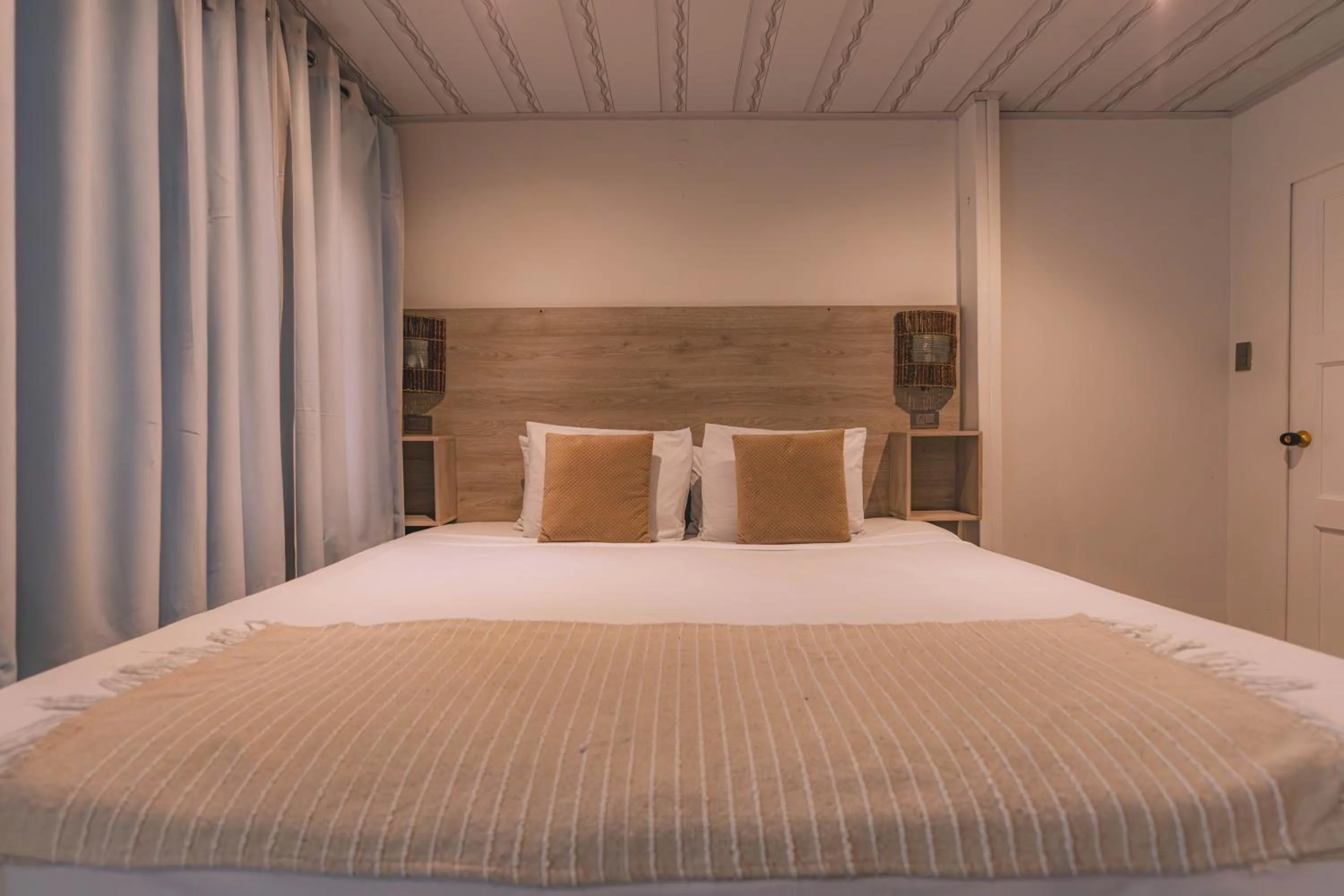 Bed in Ataraxy Hotel Boutique