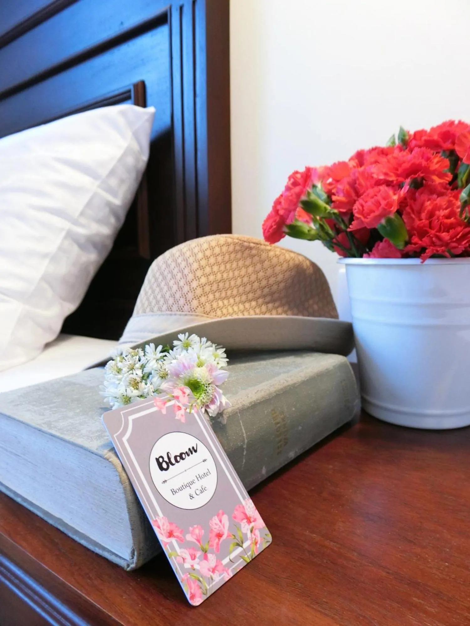 Seating area, Bed in Bloom Boutique Hotel & Cafe