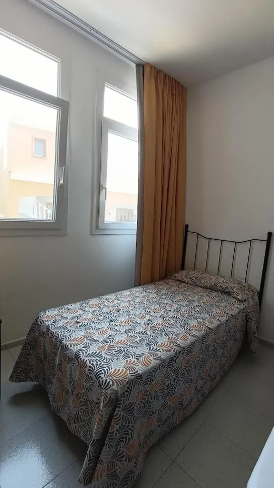 Bed in Apartamentos Boomerang II
