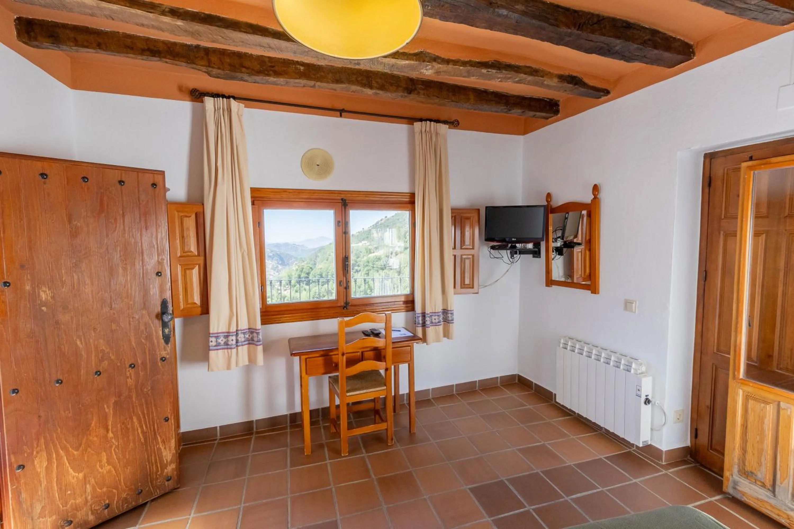 Bedroom in Hotel La Fragua I