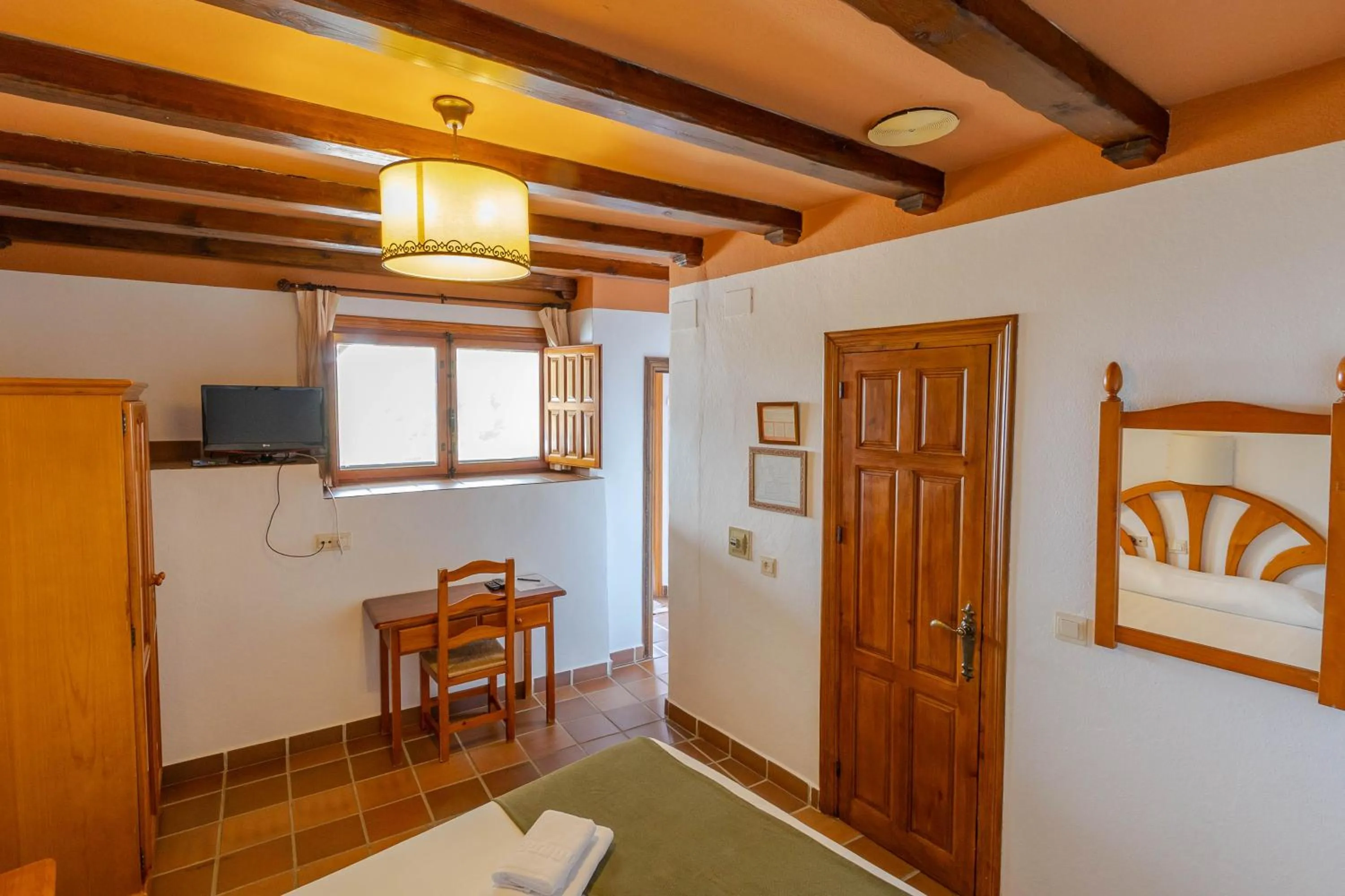 Bedroom in Hotel La Fragua I