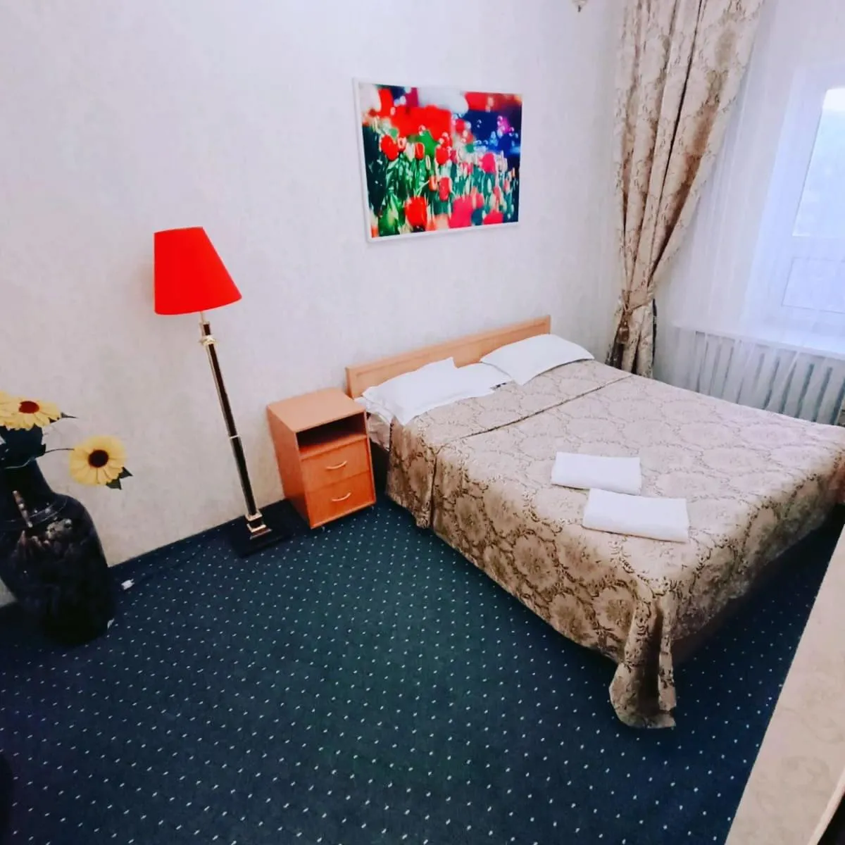 Bed in Altyn-Adam Hotel