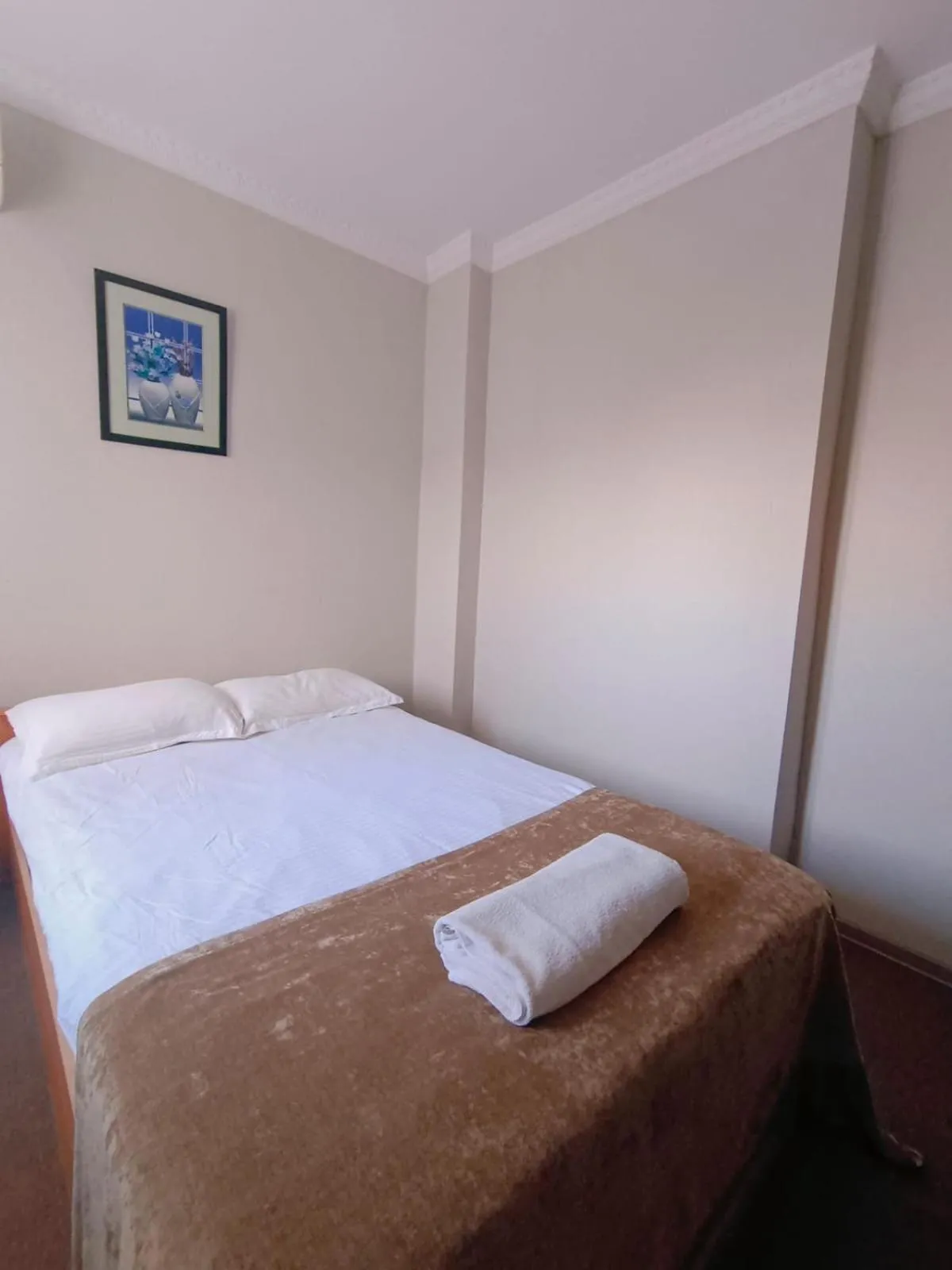 Bed in Altyn-Adam Hotel
